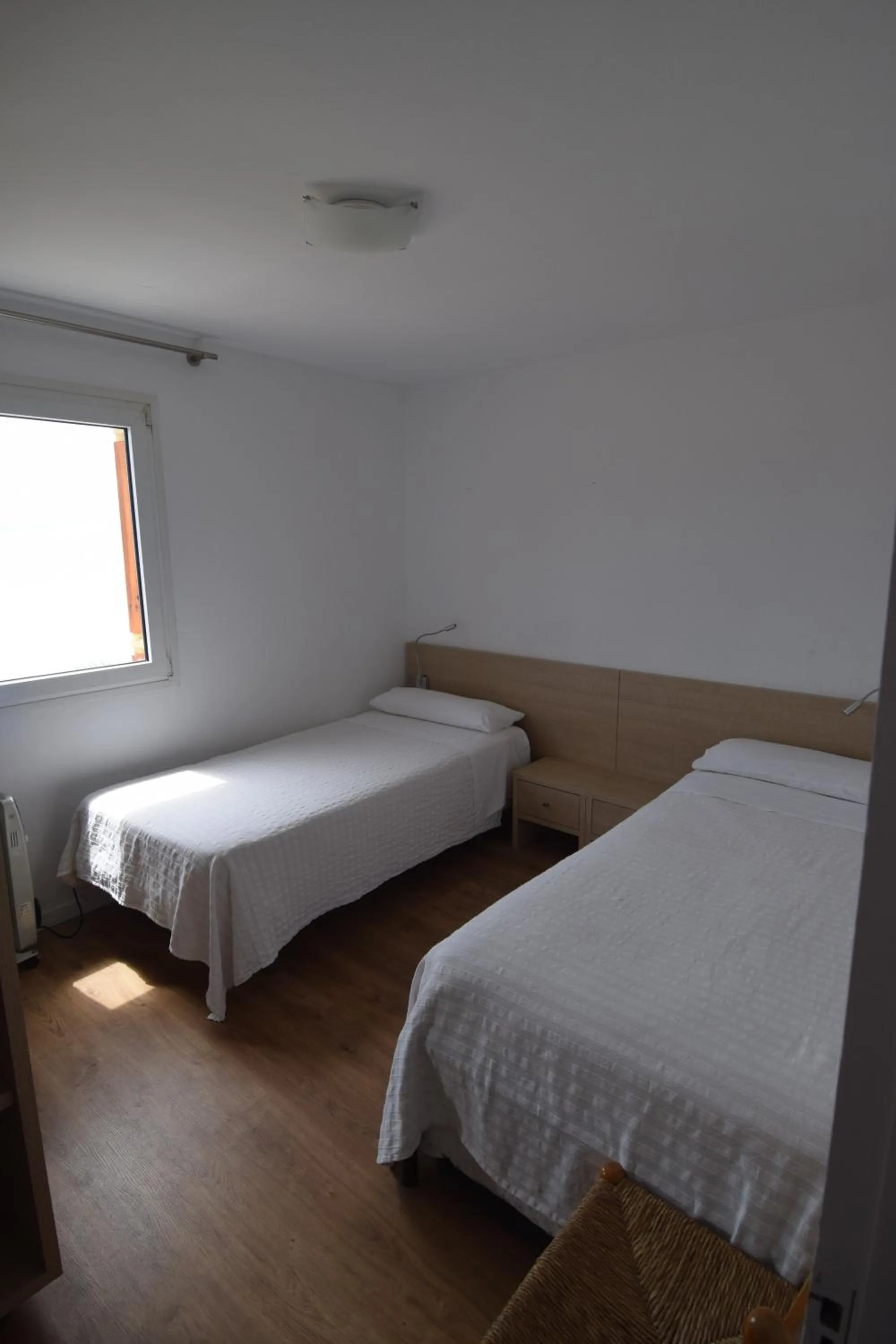 Kitchen or kitchenette, Bed in Santa Llucia Apartaments