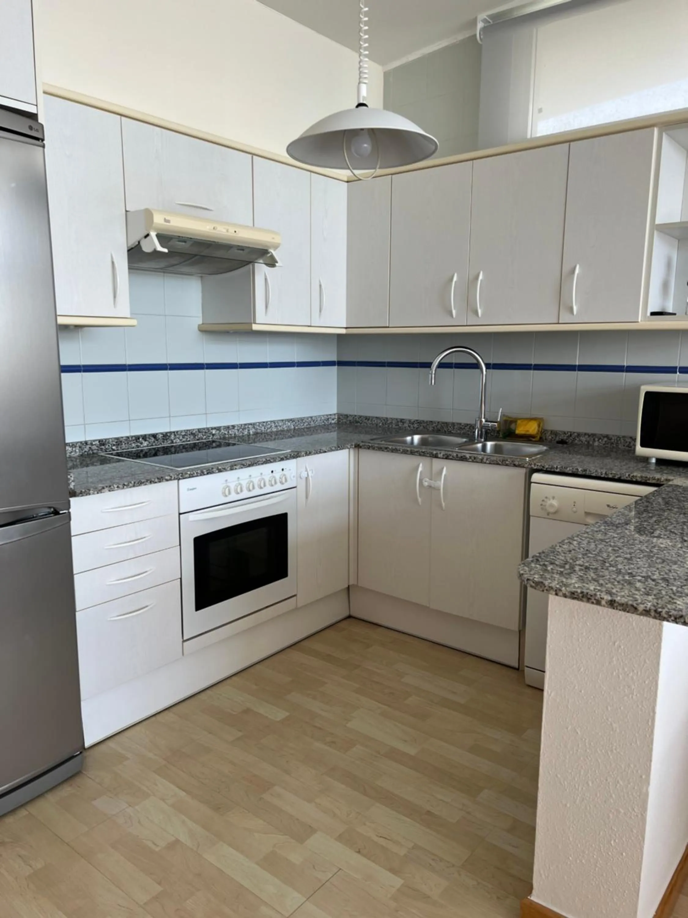Kitchen or kitchenette in Santa Llucia Apartaments
