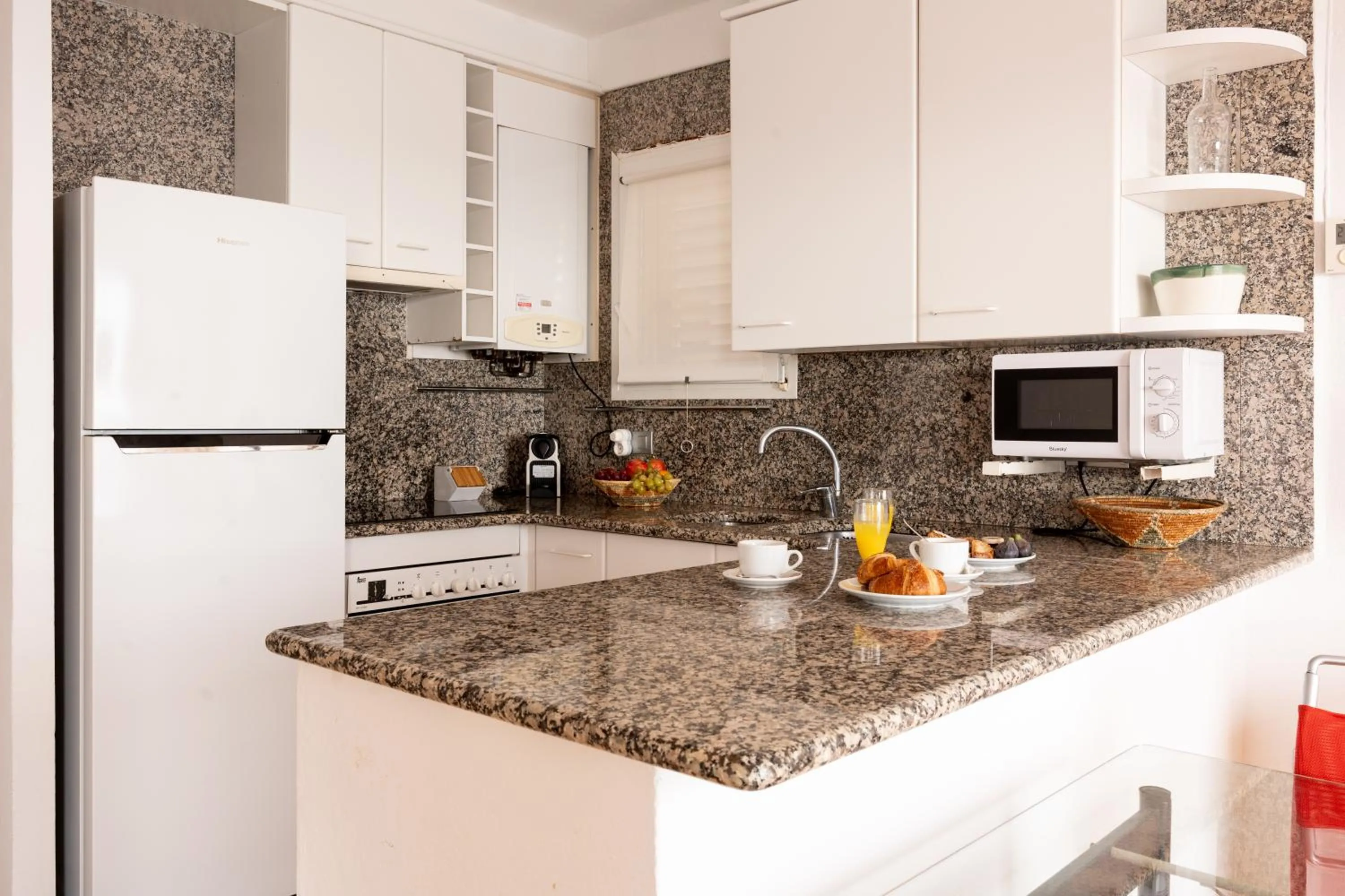 Kitchen or kitchenette in Santa Llucia Apartaments