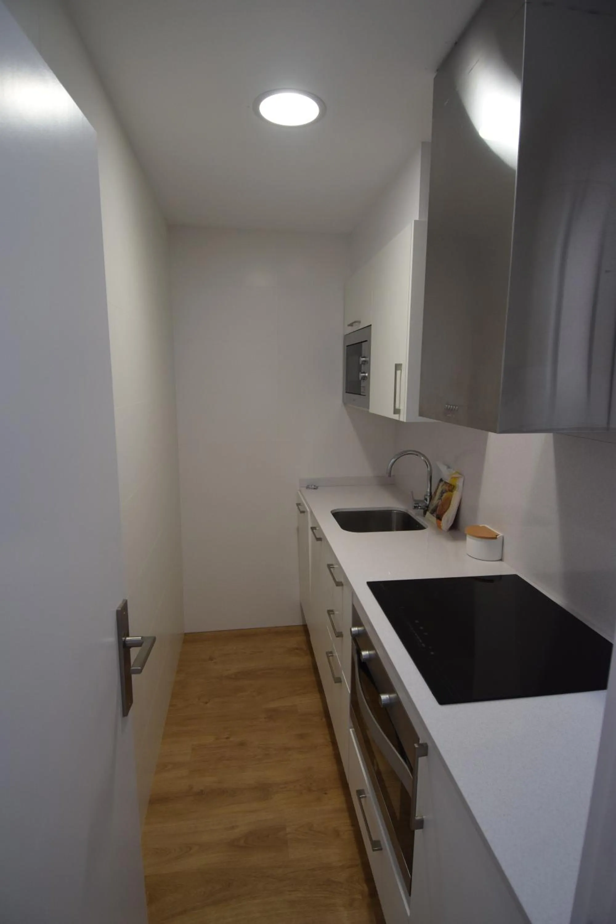 Kitchen or kitchenette in Santa Llucia Apartaments