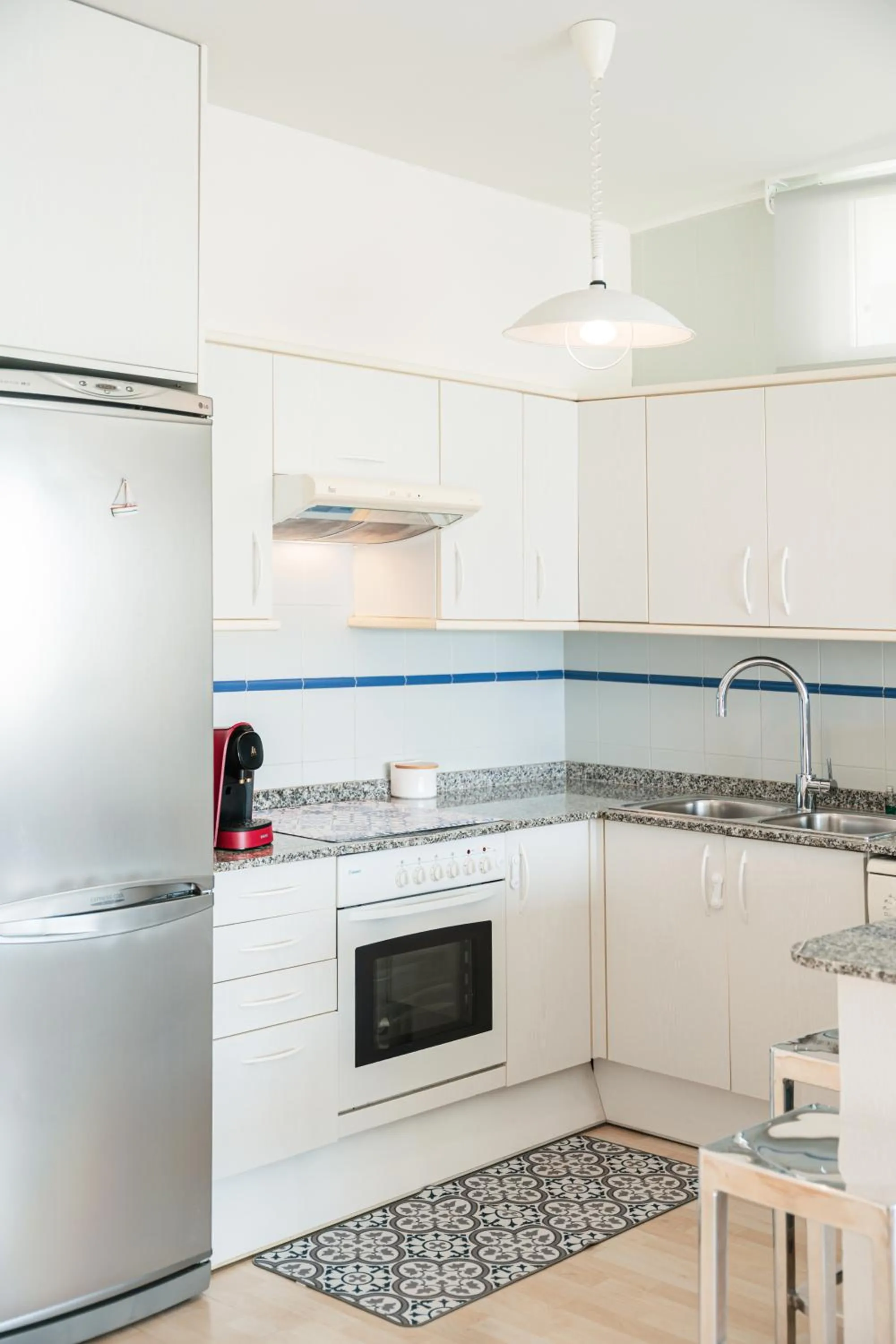 Kitchen or kitchenette in Santa Llucia Apartaments