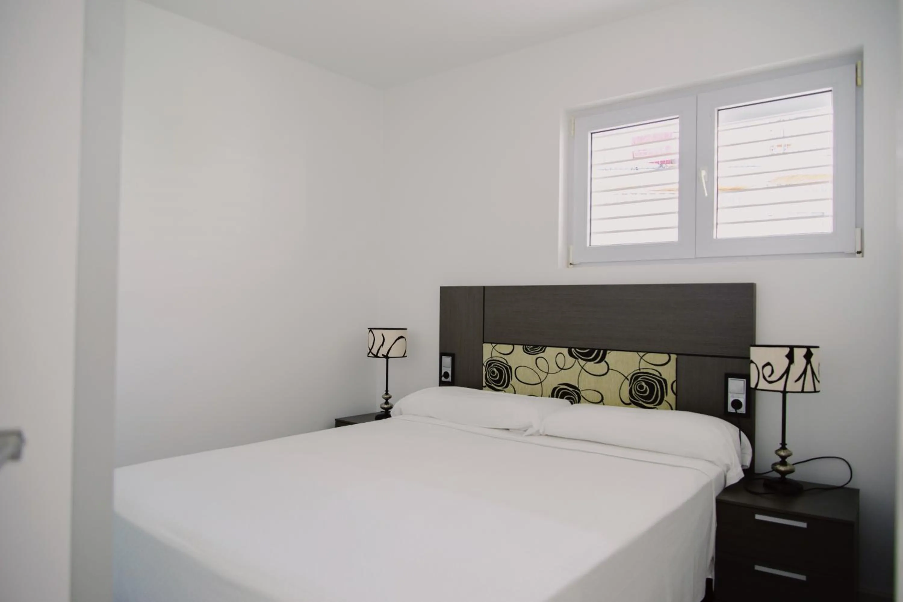 Bed in Santa Llucia Apartaments
