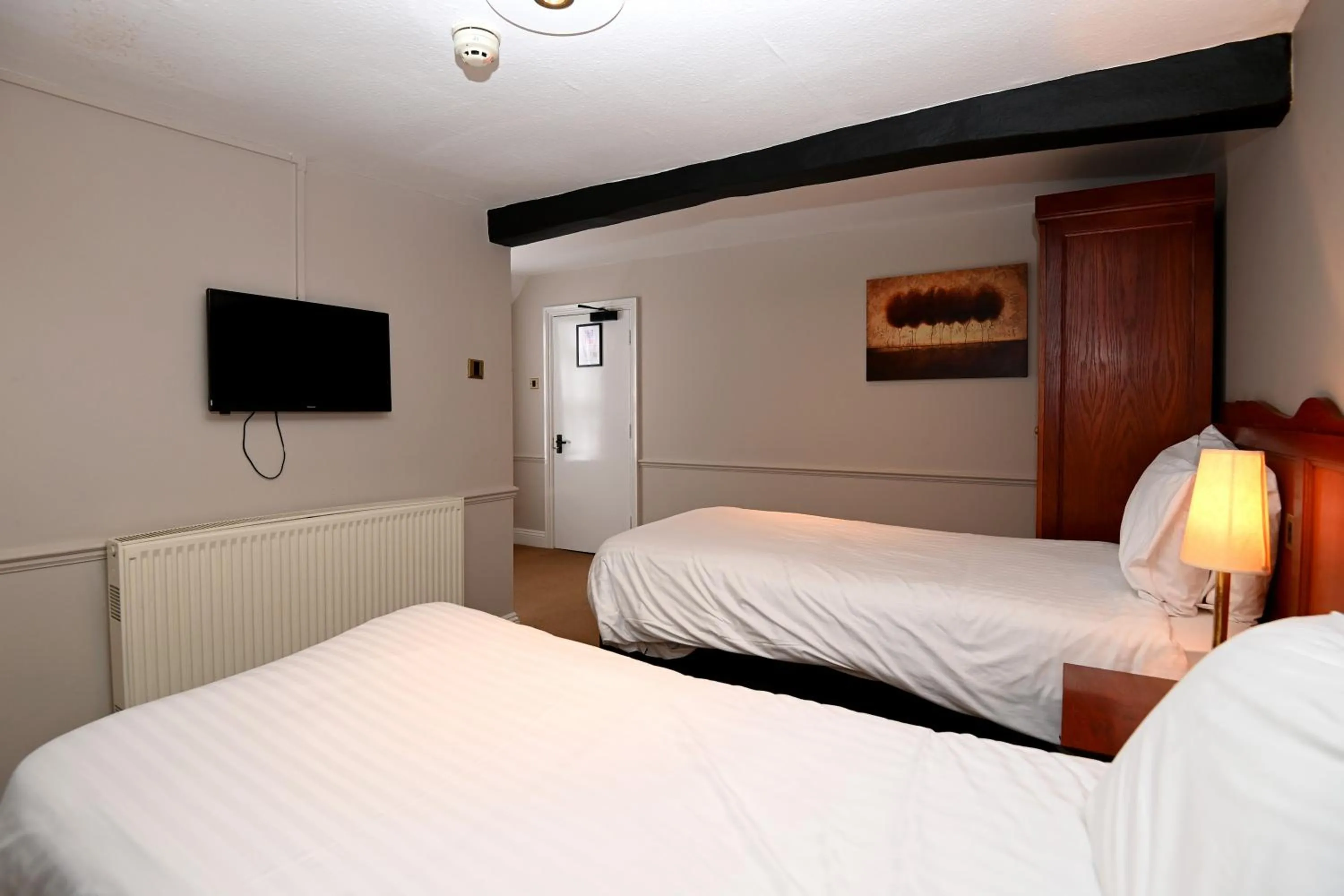 Bedroom, Bed in Original White Hart, Ringwood by Marston's Inns