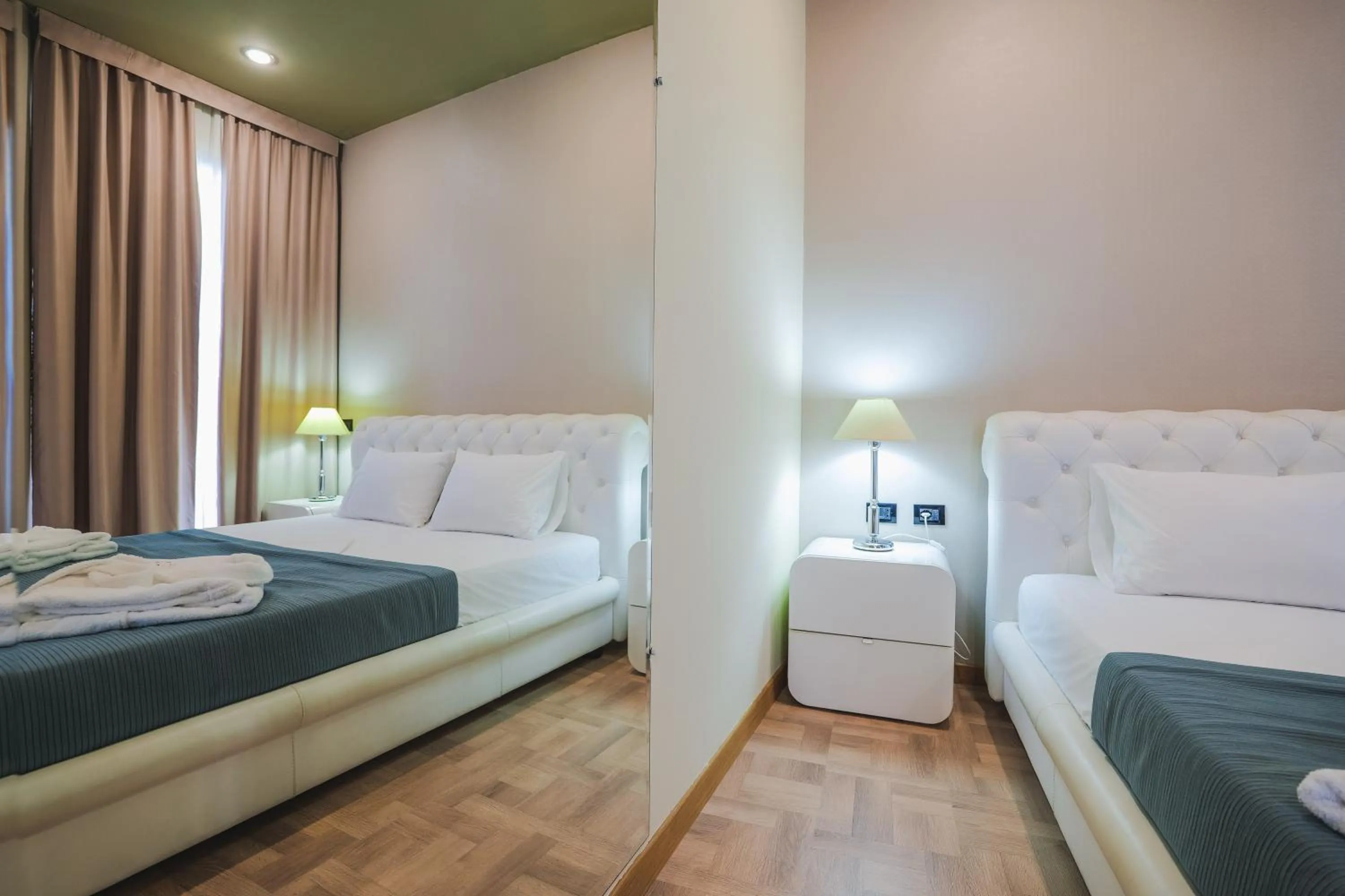 Bed in Rapo's Resort Hotel