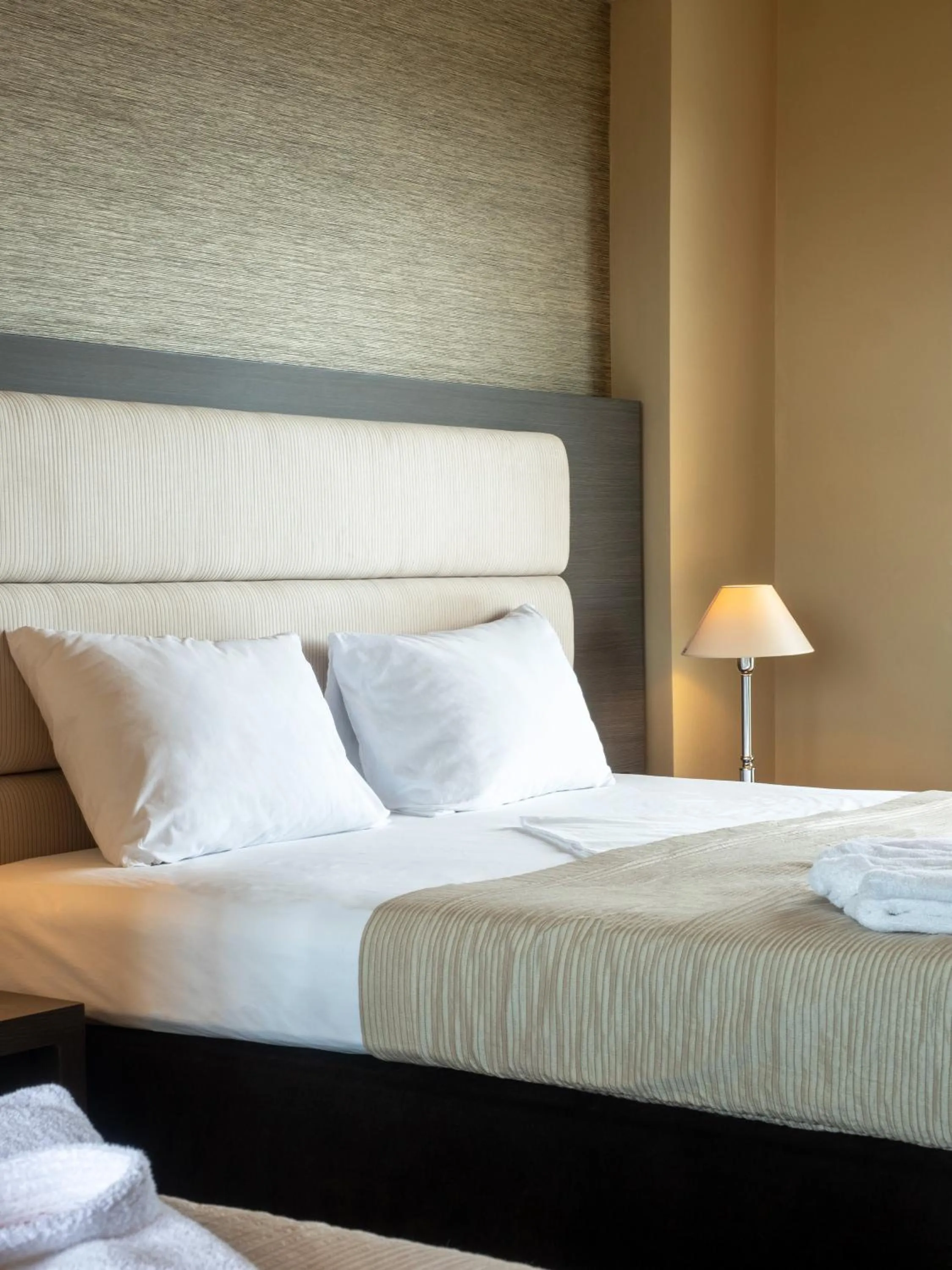 Bed in Rapo's Resort Hotel