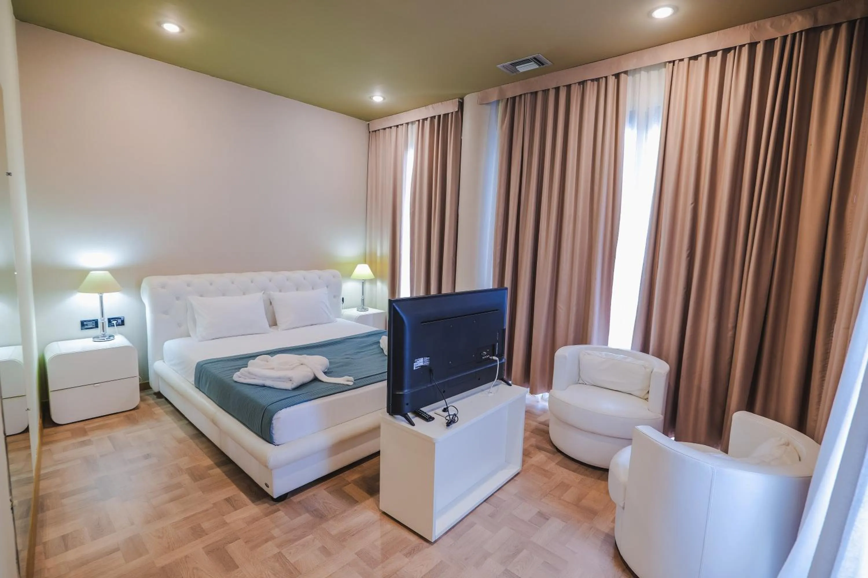 Bedroom in Rapo's Resort Hotel