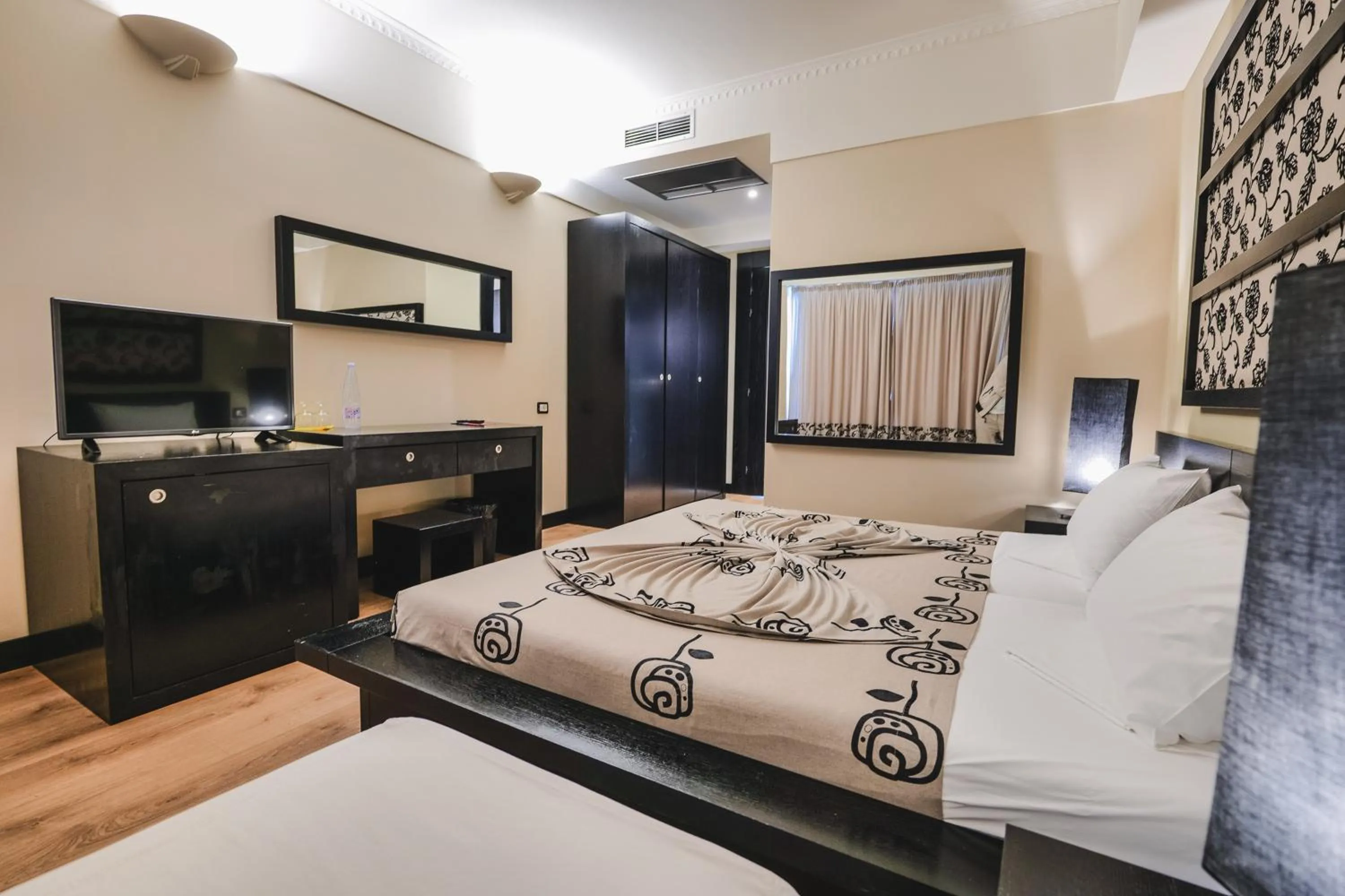 Bedroom in Rapo's Resort Hotel