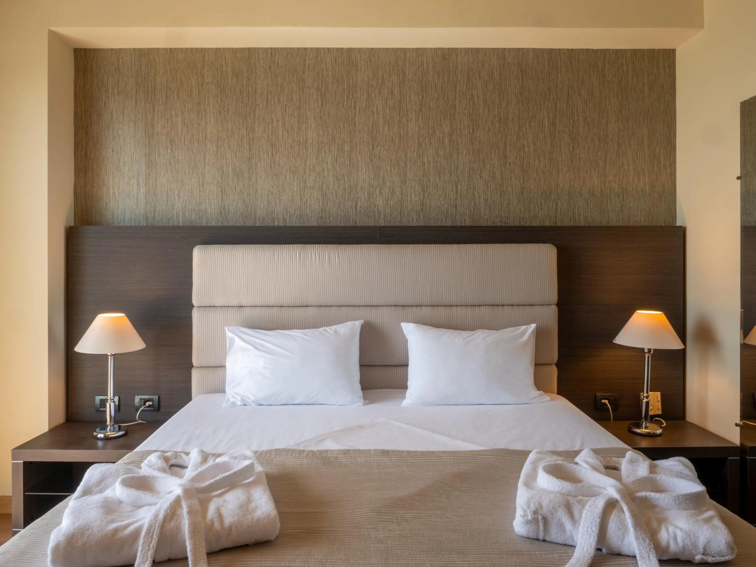 Bed in Rapo's Resort Hotel