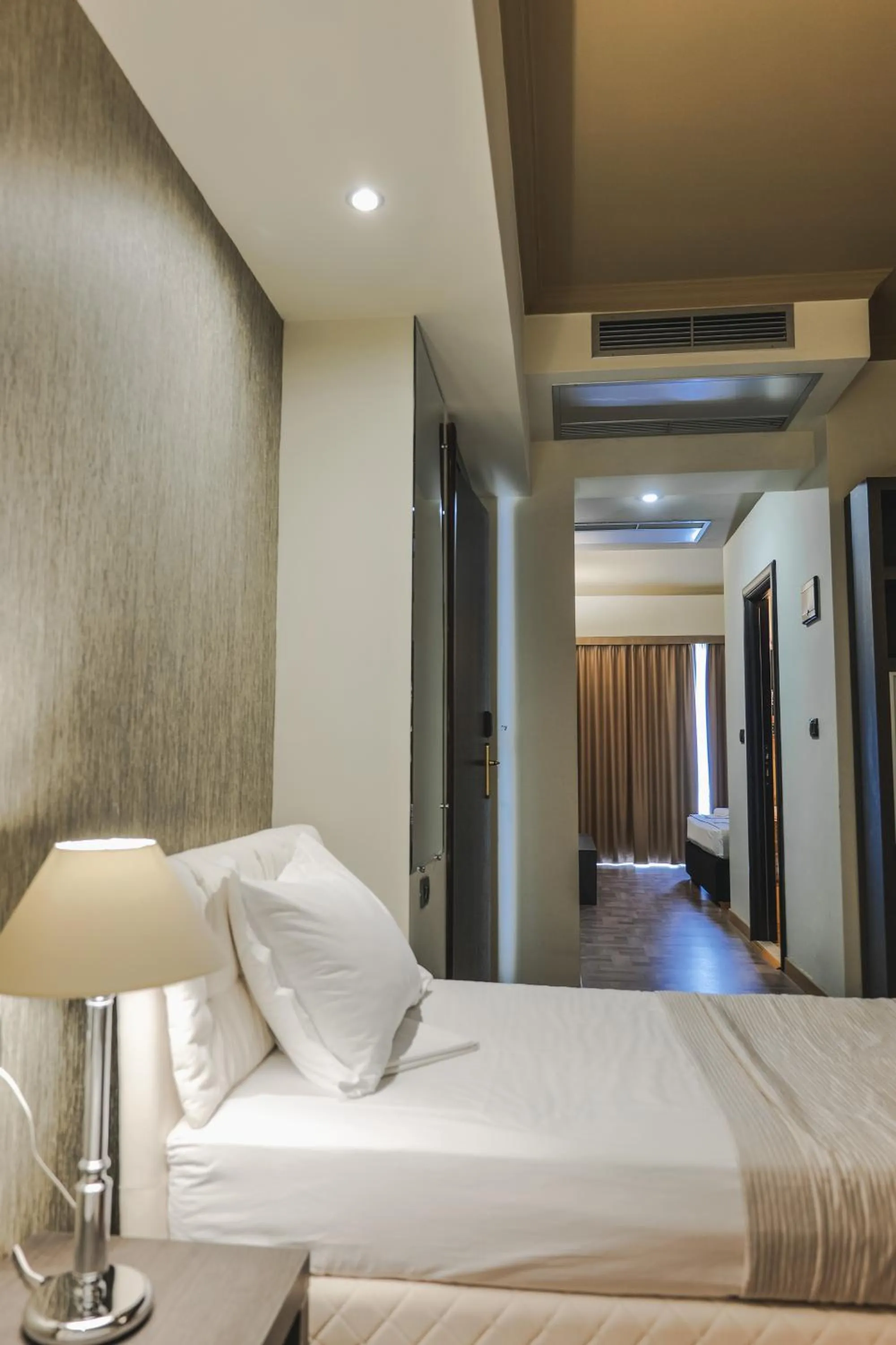 Bedroom in Rapo's Resort Hotel