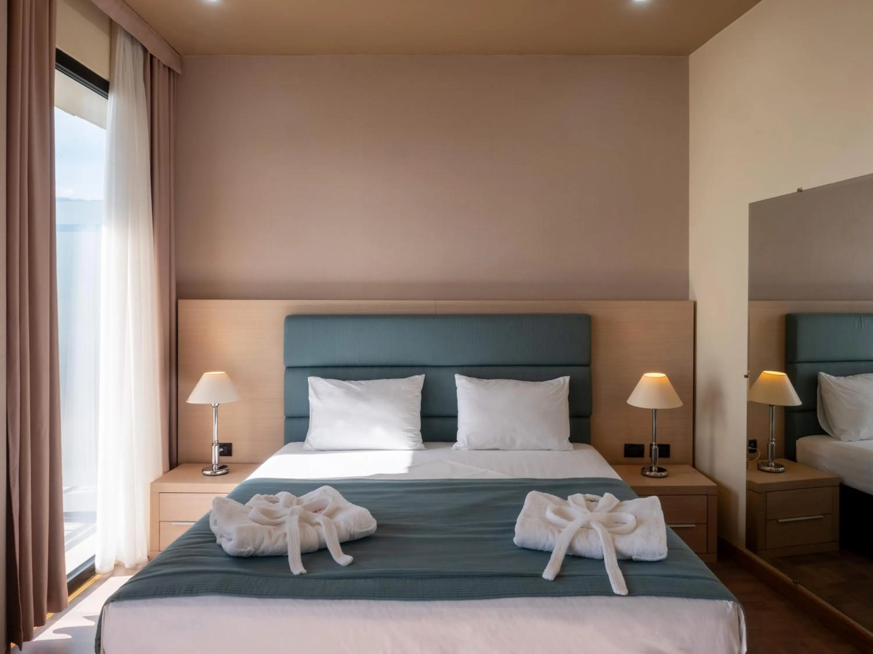 Bed in Rapo's Resort Hotel