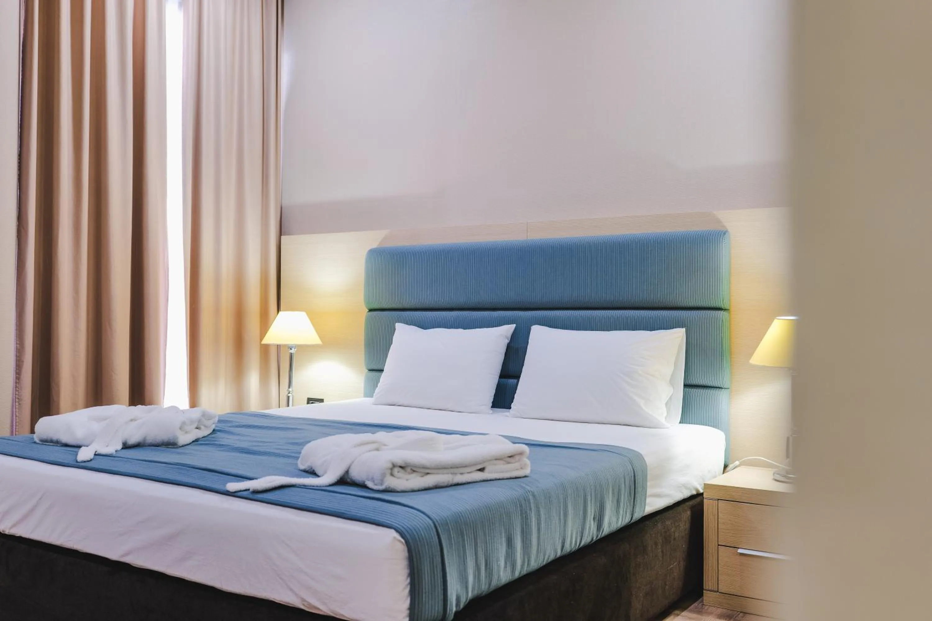 Bedroom in Rapo's Resort Hotel