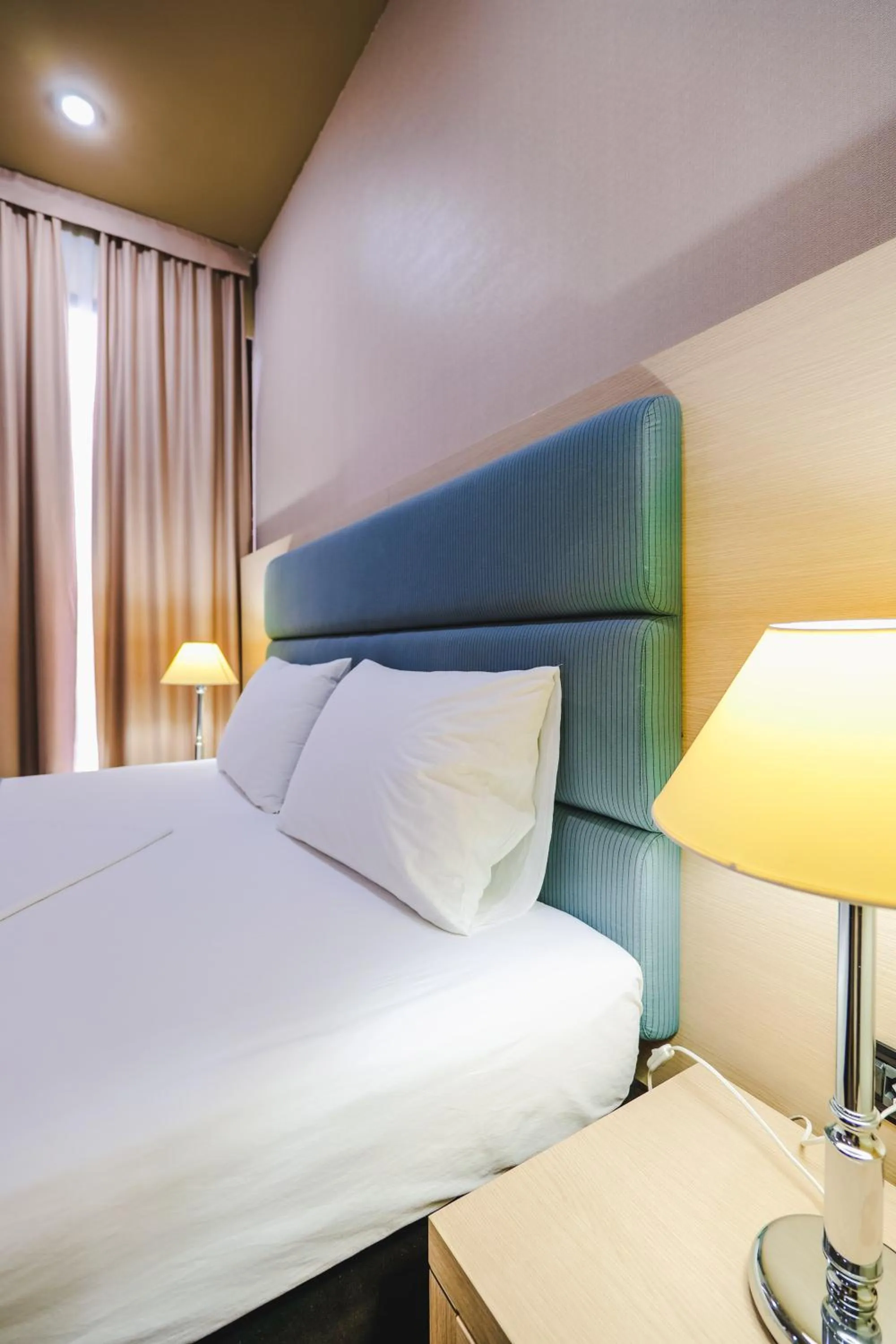 Bedroom in Rapo's Resort Hotel