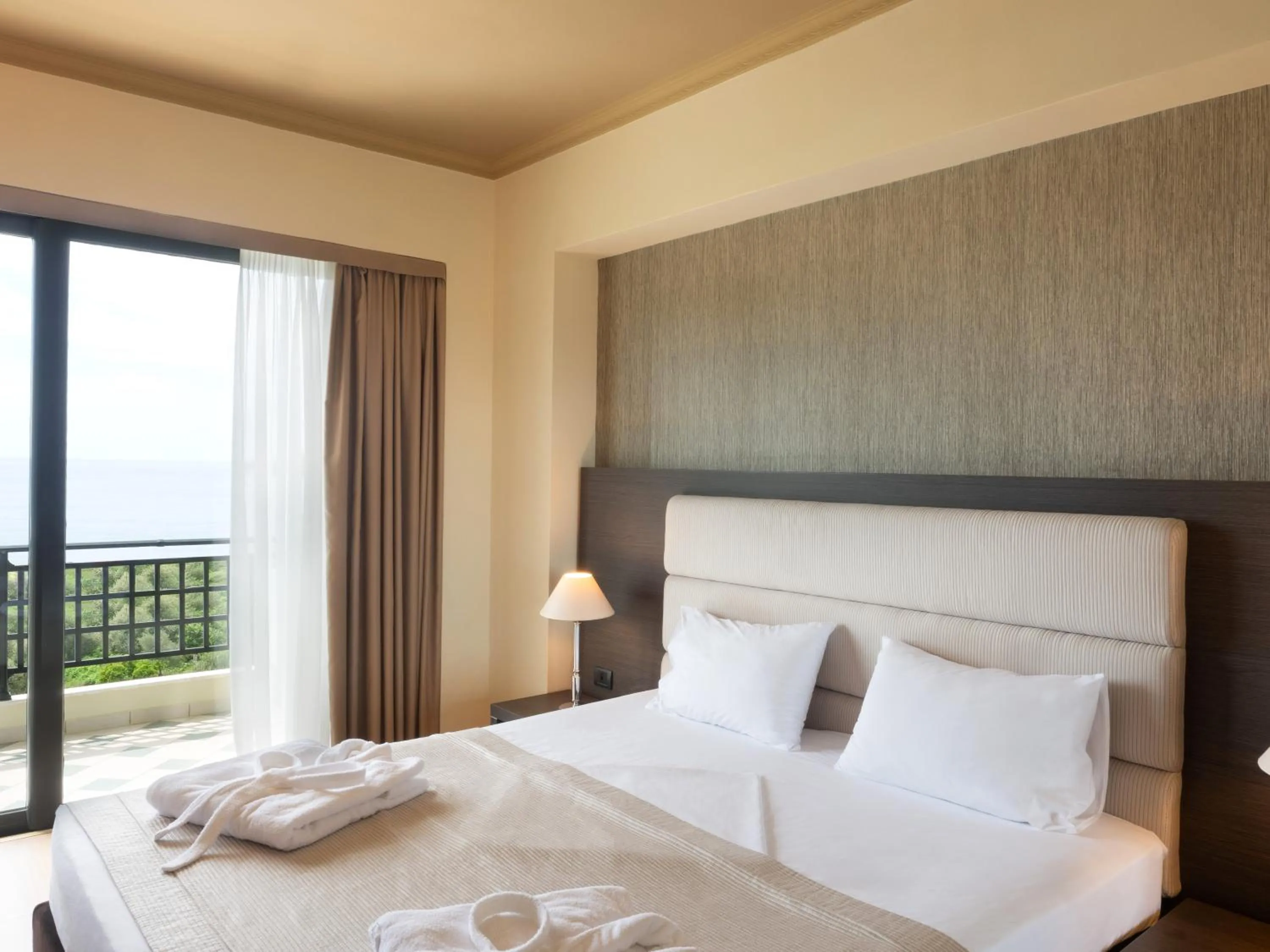 Bed in Rapo's Resort Hotel