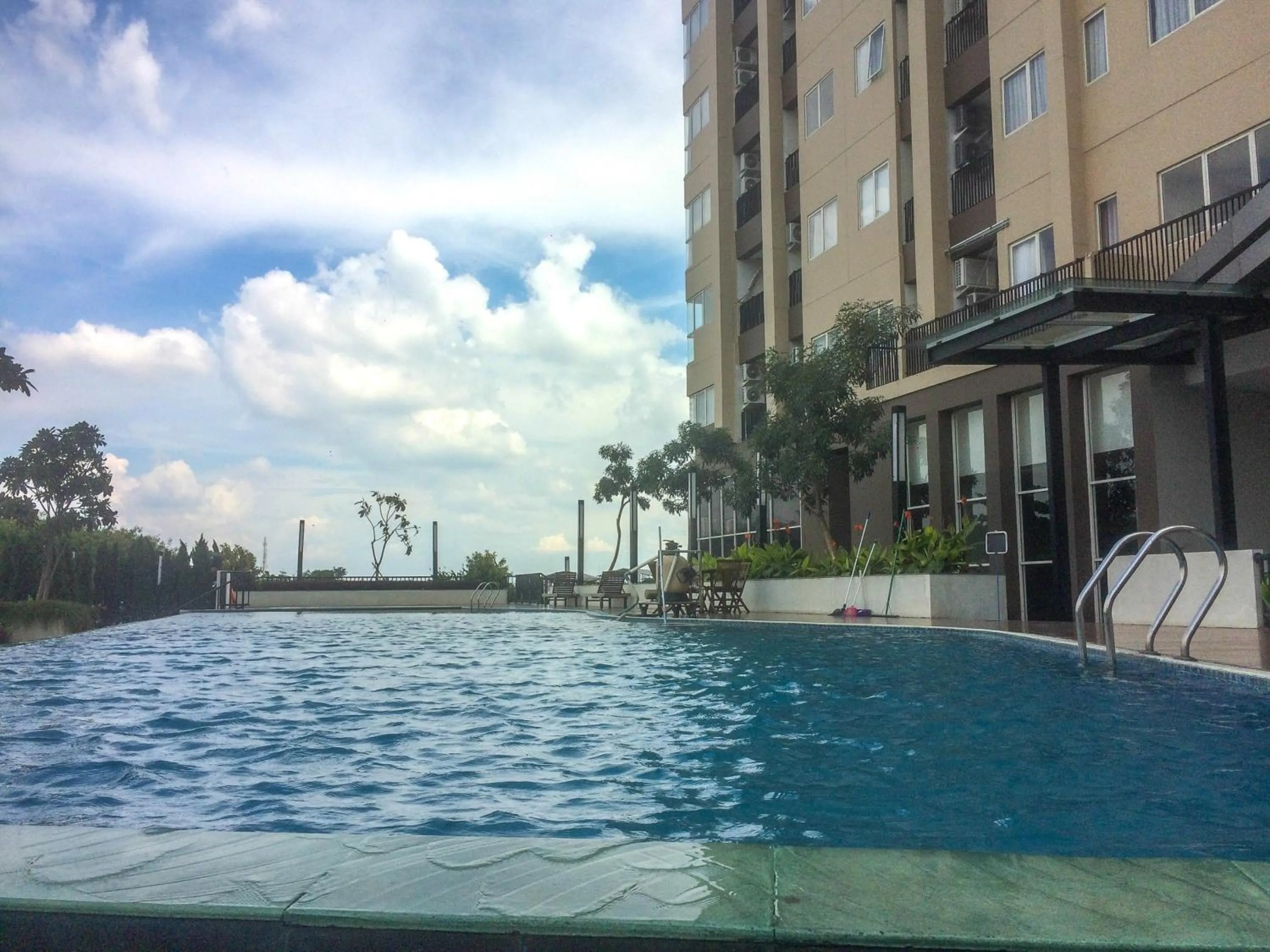 Property building in Best Price 1BR Apartment at The Oasis Cikarang By Travelio