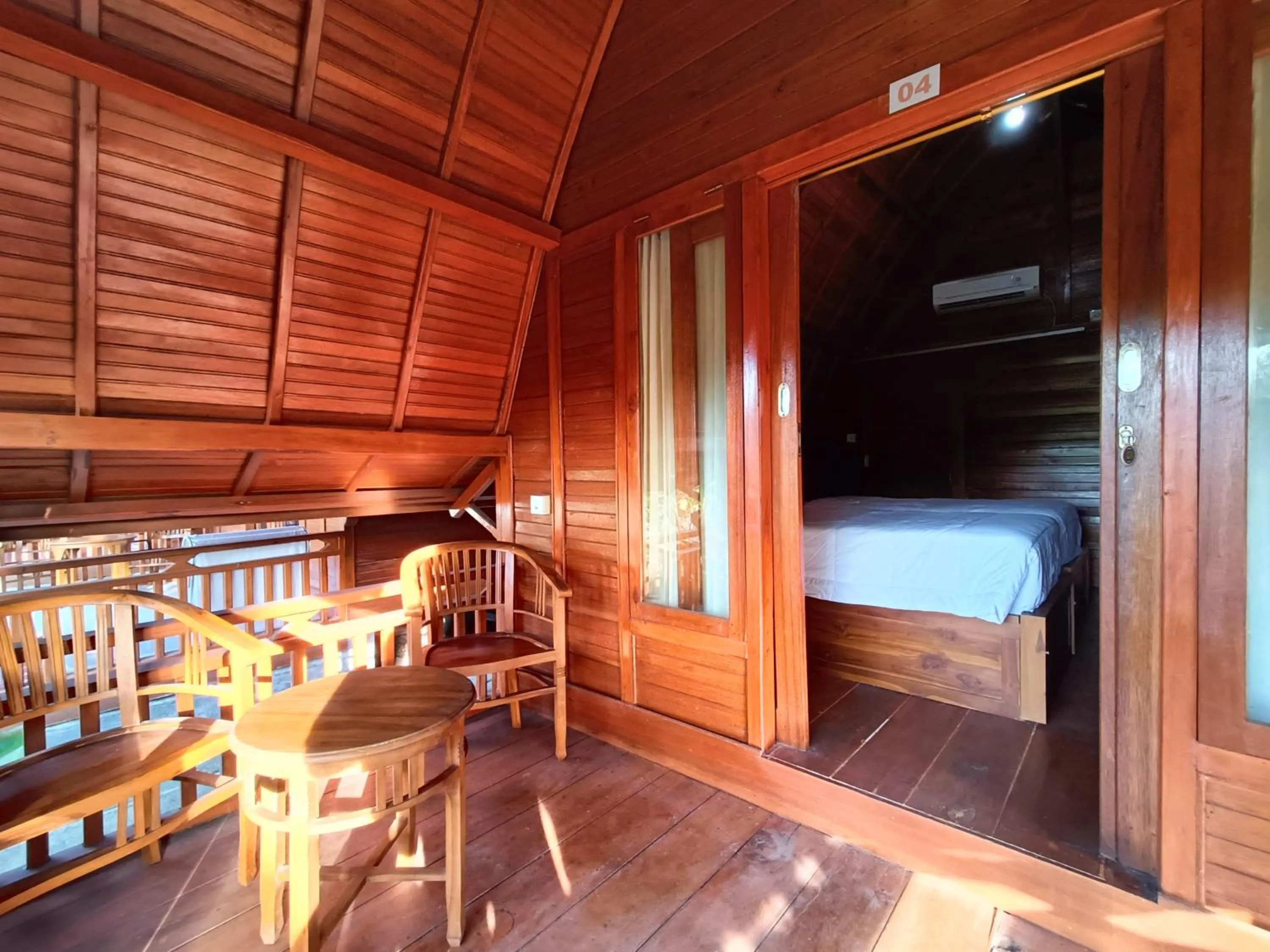 Patio, Bed in Dekara Cottages