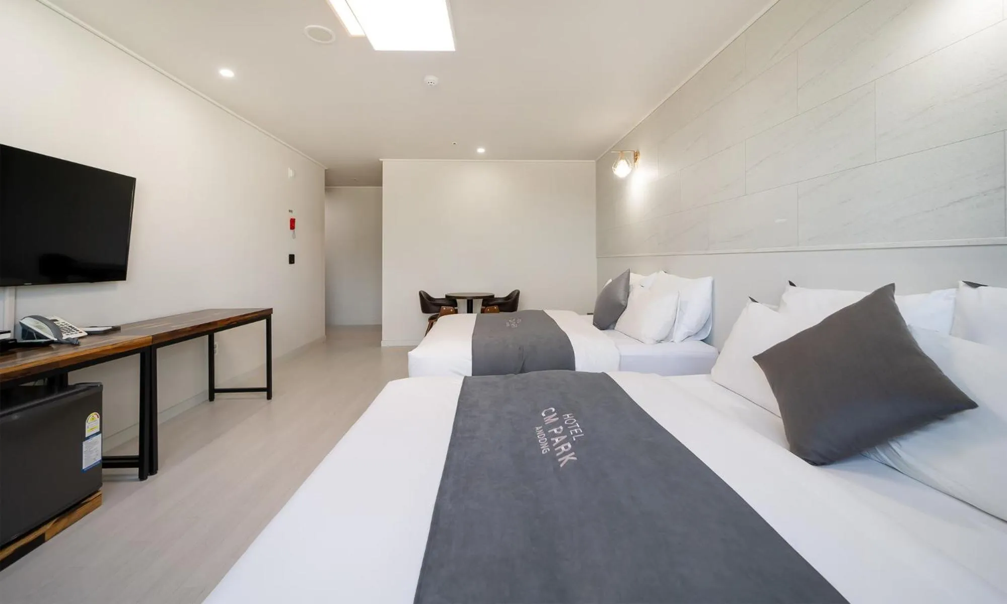 Bed in CM Park Hotel