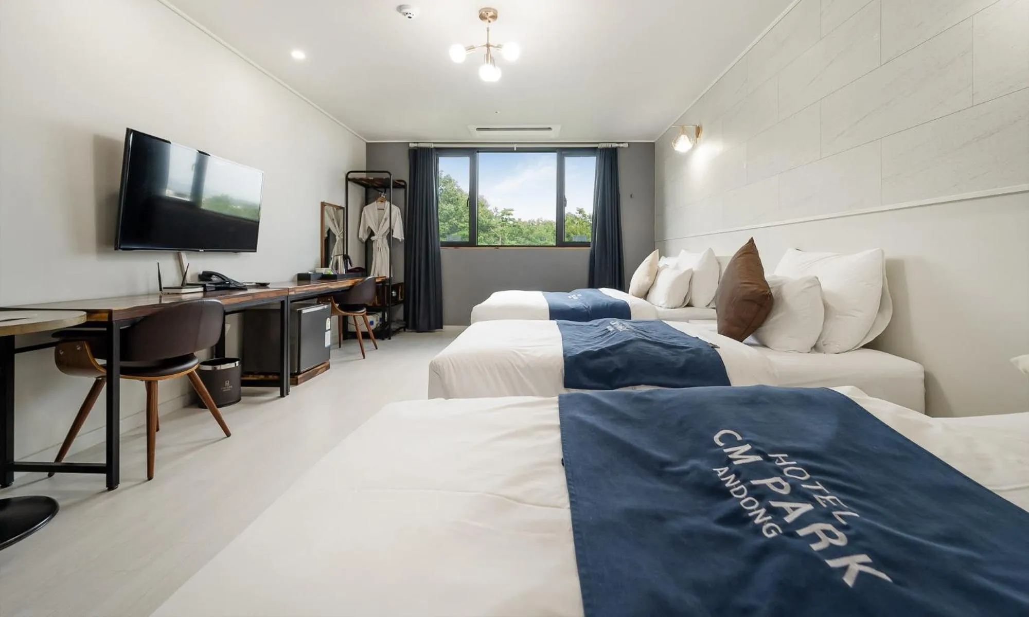 Bed in CM Park Hotel