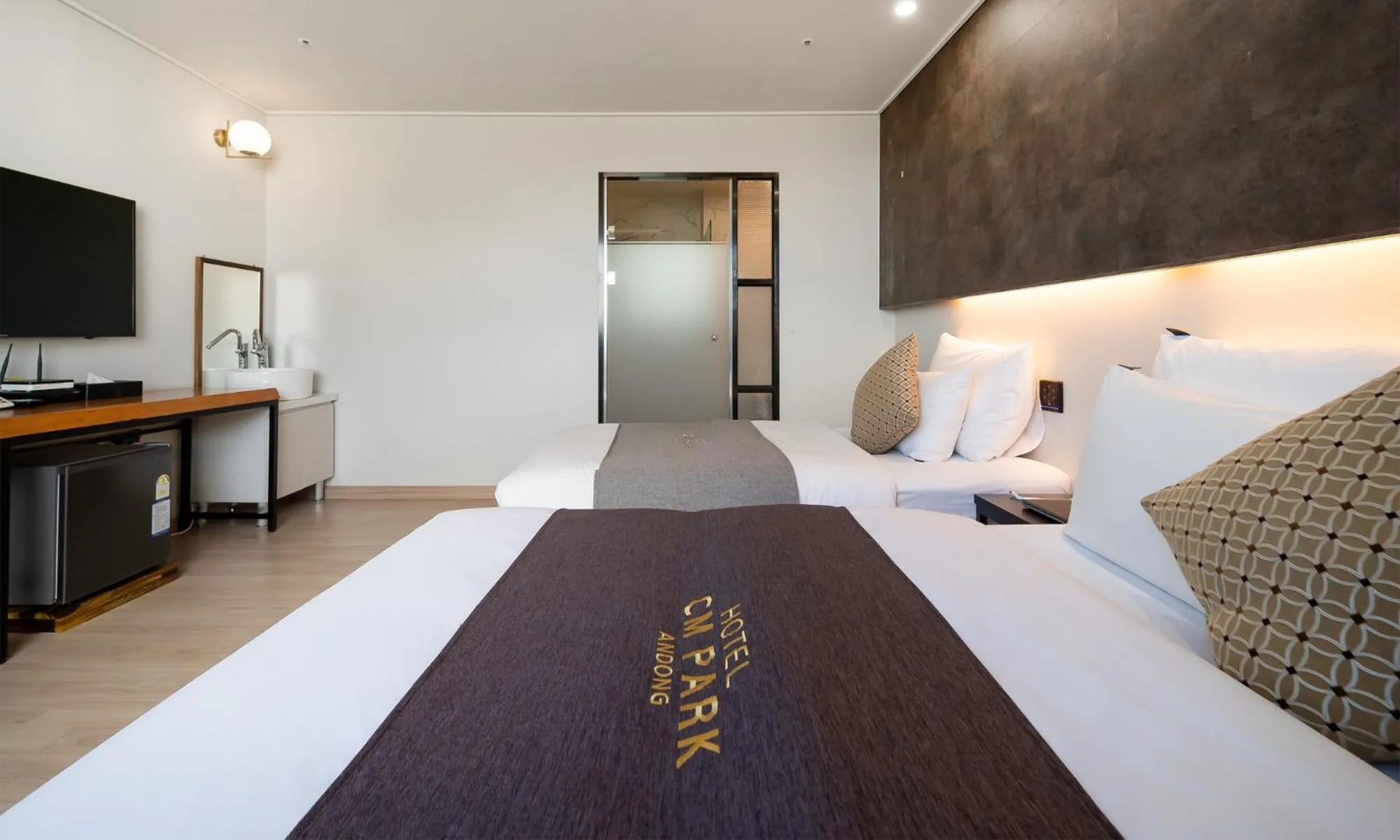 Bed in CM Park Hotel