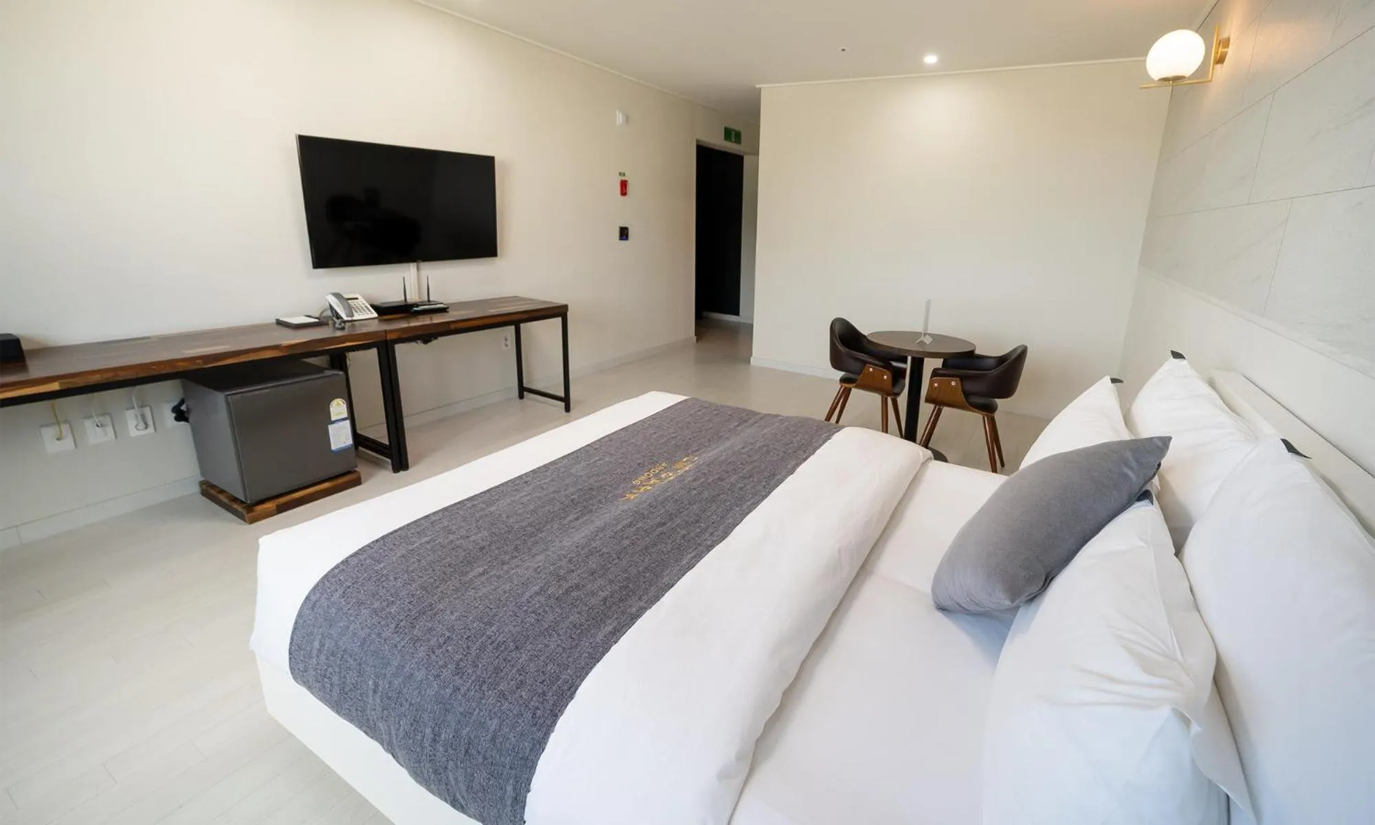 Bed in CM Park Hotel