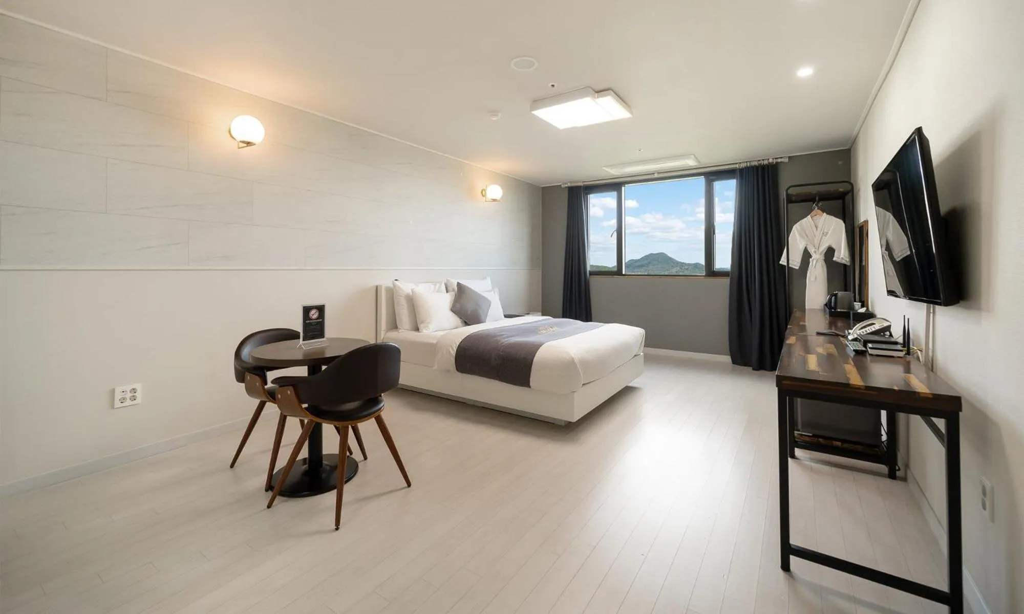 Bed in CM Park Hotel