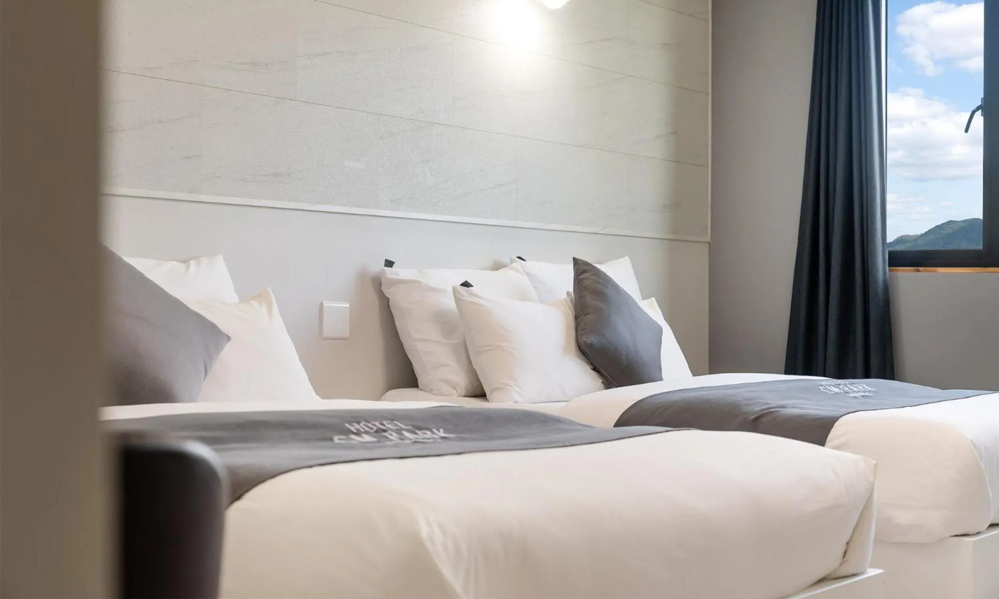 Bed in CM Park Hotel