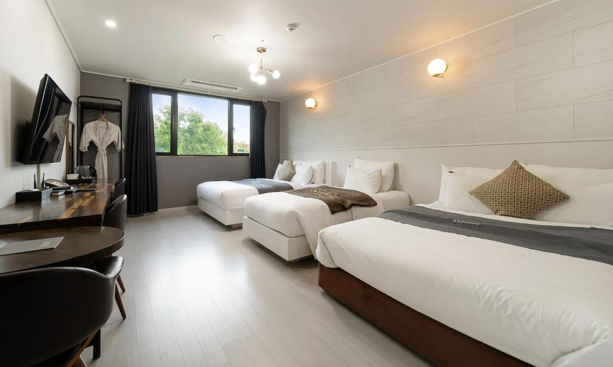 Bed in CM Park Hotel