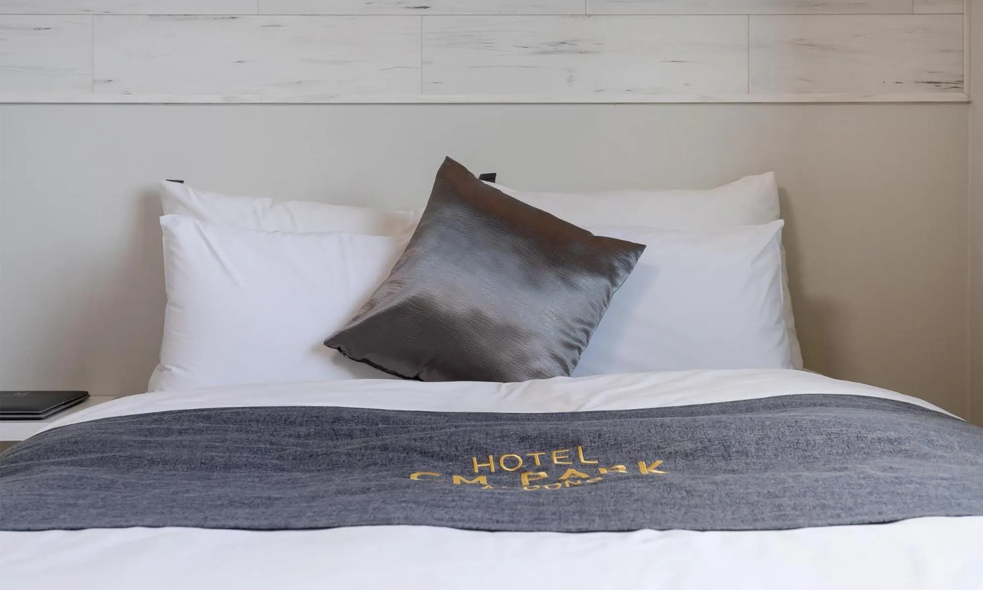 Bed in CM Park Hotel