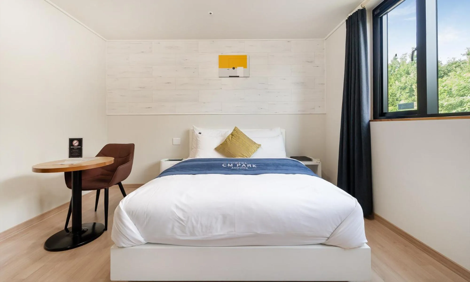 Bed in CM Park Hotel