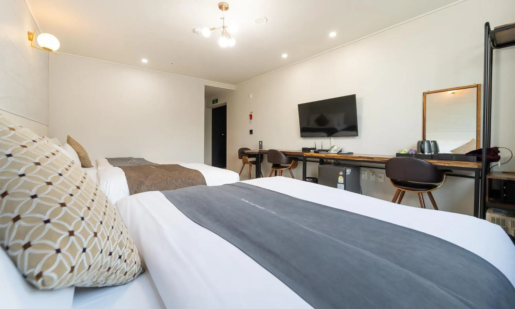 Bed in CM Park Hotel