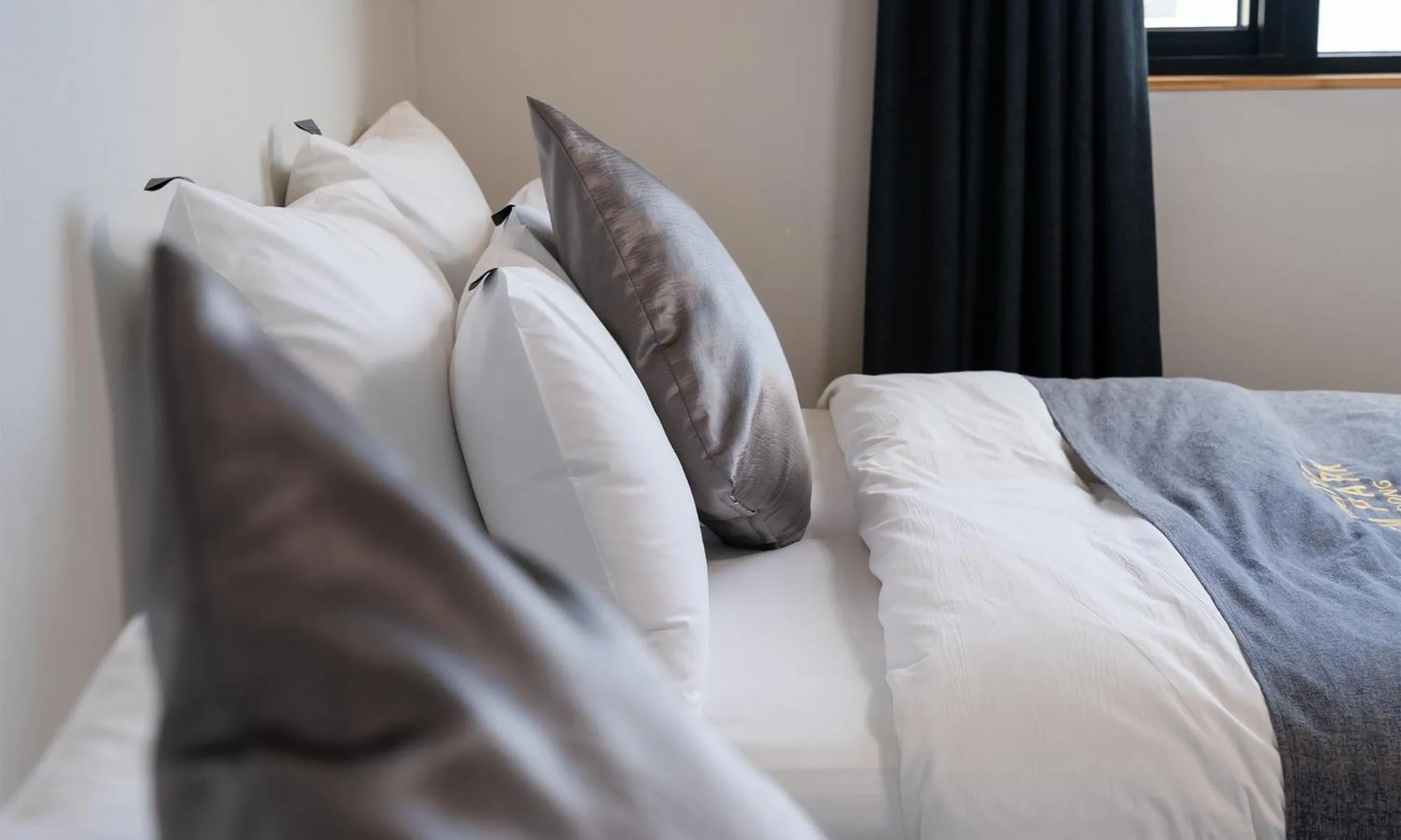 Bed in CM Park Hotel