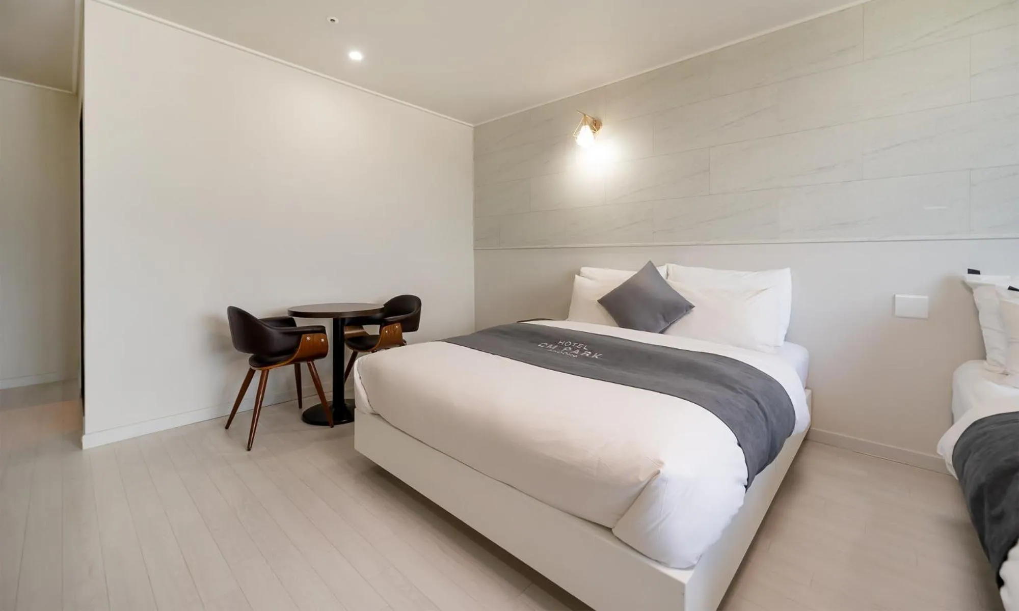 Bed in CM Park Hotel