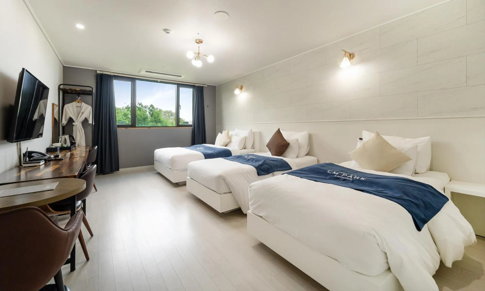 Bed in CM Park Hotel