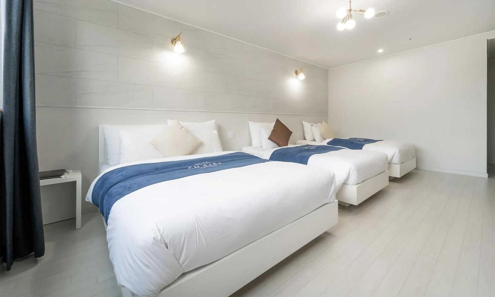 Bed in CM Park Hotel