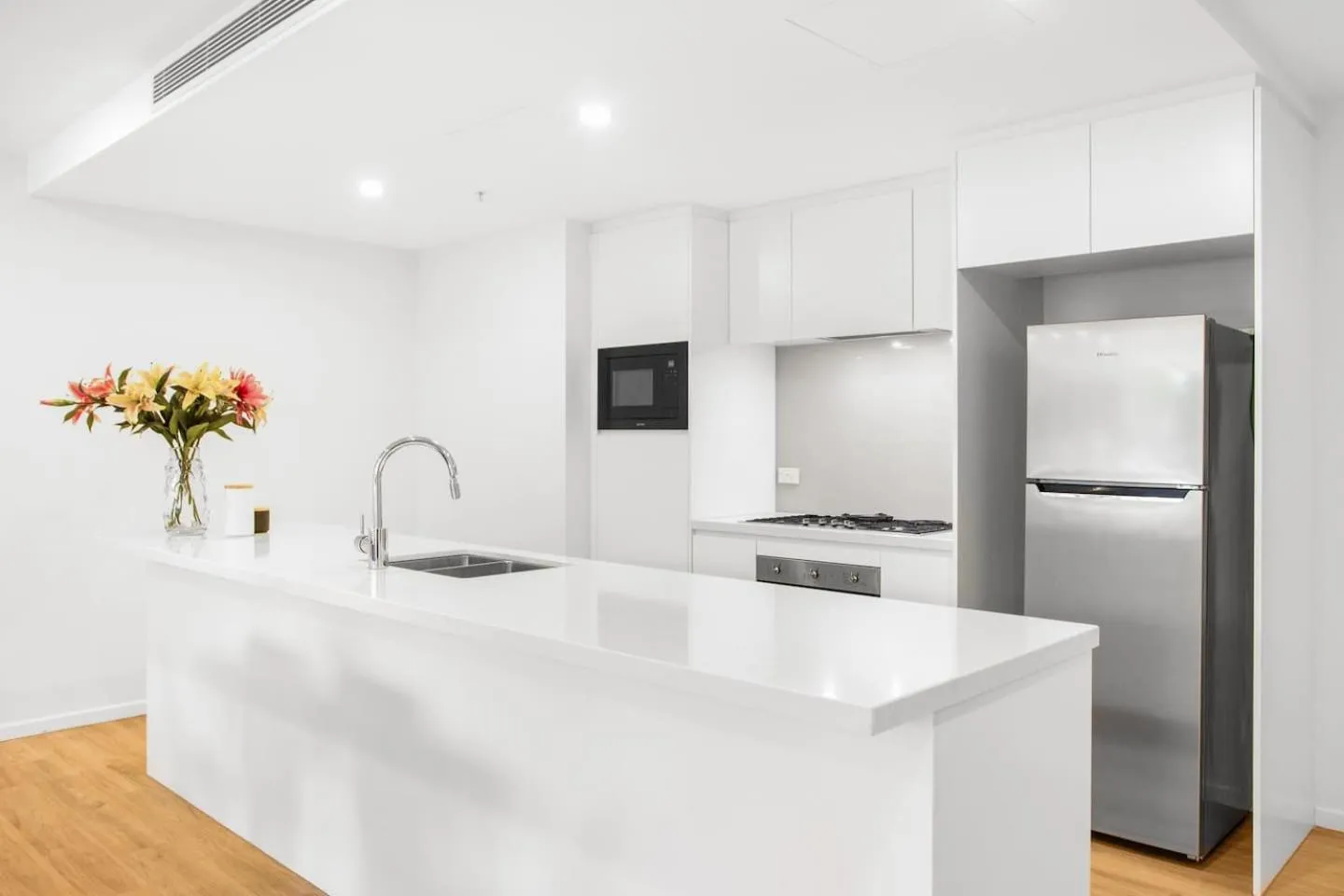 Kitchen or kitchenette in Ruby Gold Coast By Serain