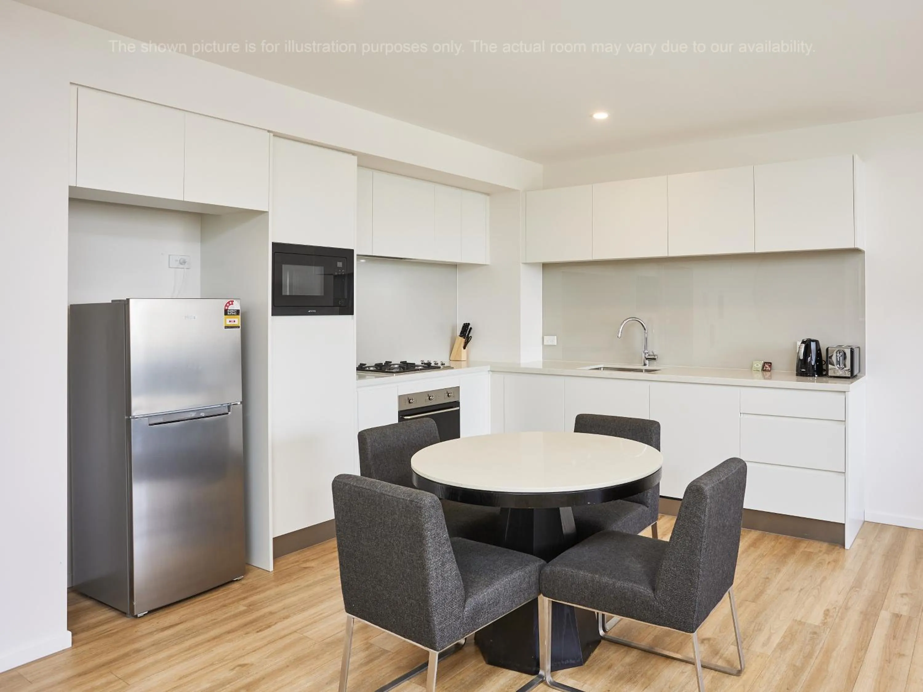 Kitchen or kitchenette in Ruby Gold Coast By Serain