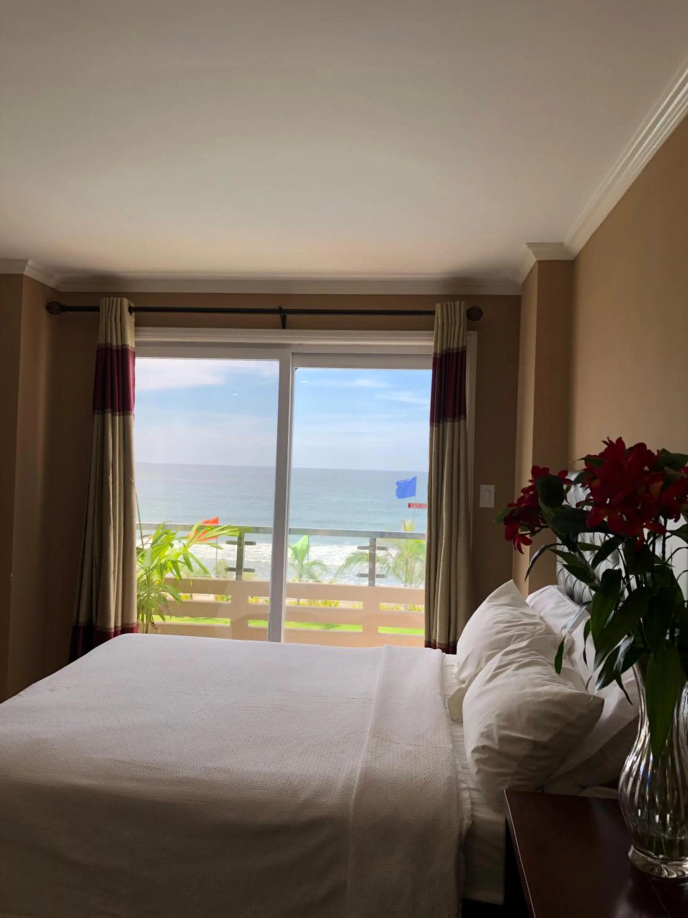 Bed in EM Royalle Hotel & Beach Resort