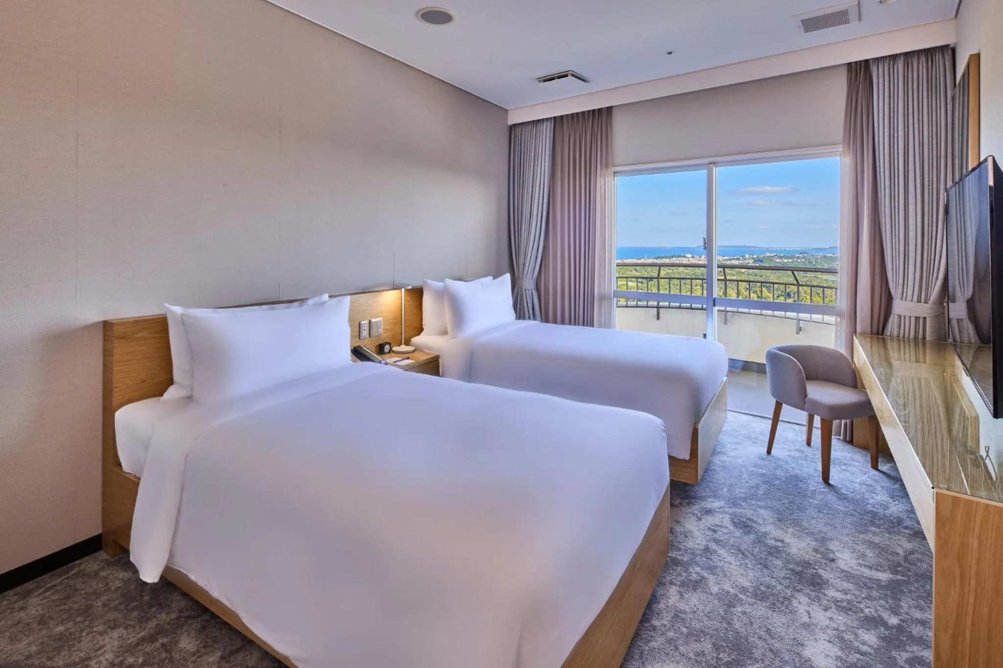 Photo of the whole room, Bed in ANA Crowne Plaza Resort Okinawa Uruma Hills By IHG
