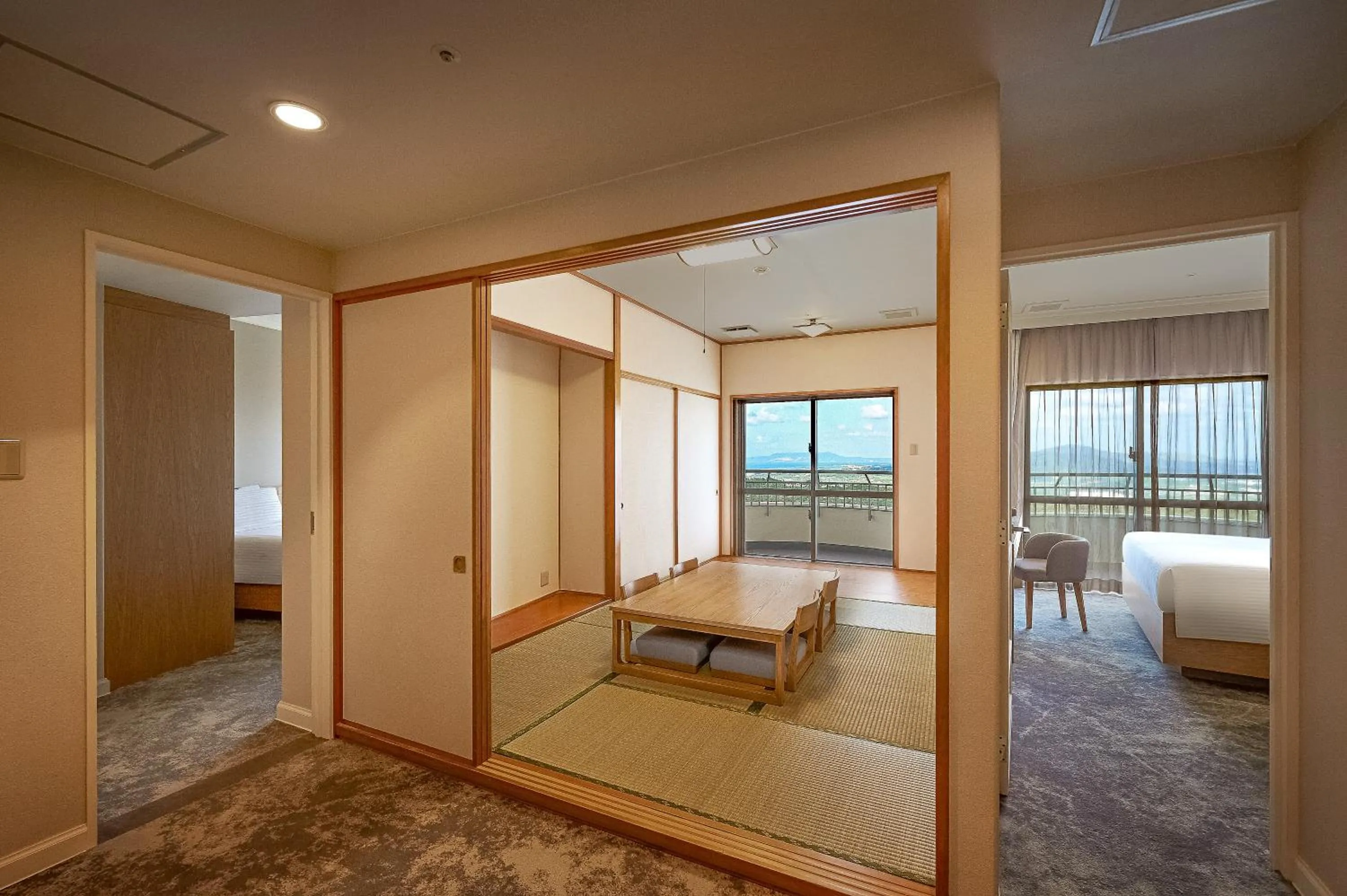 Living room, Bed in ANA Crowne Plaza Resort Okinawa Uruma Hills By IHG