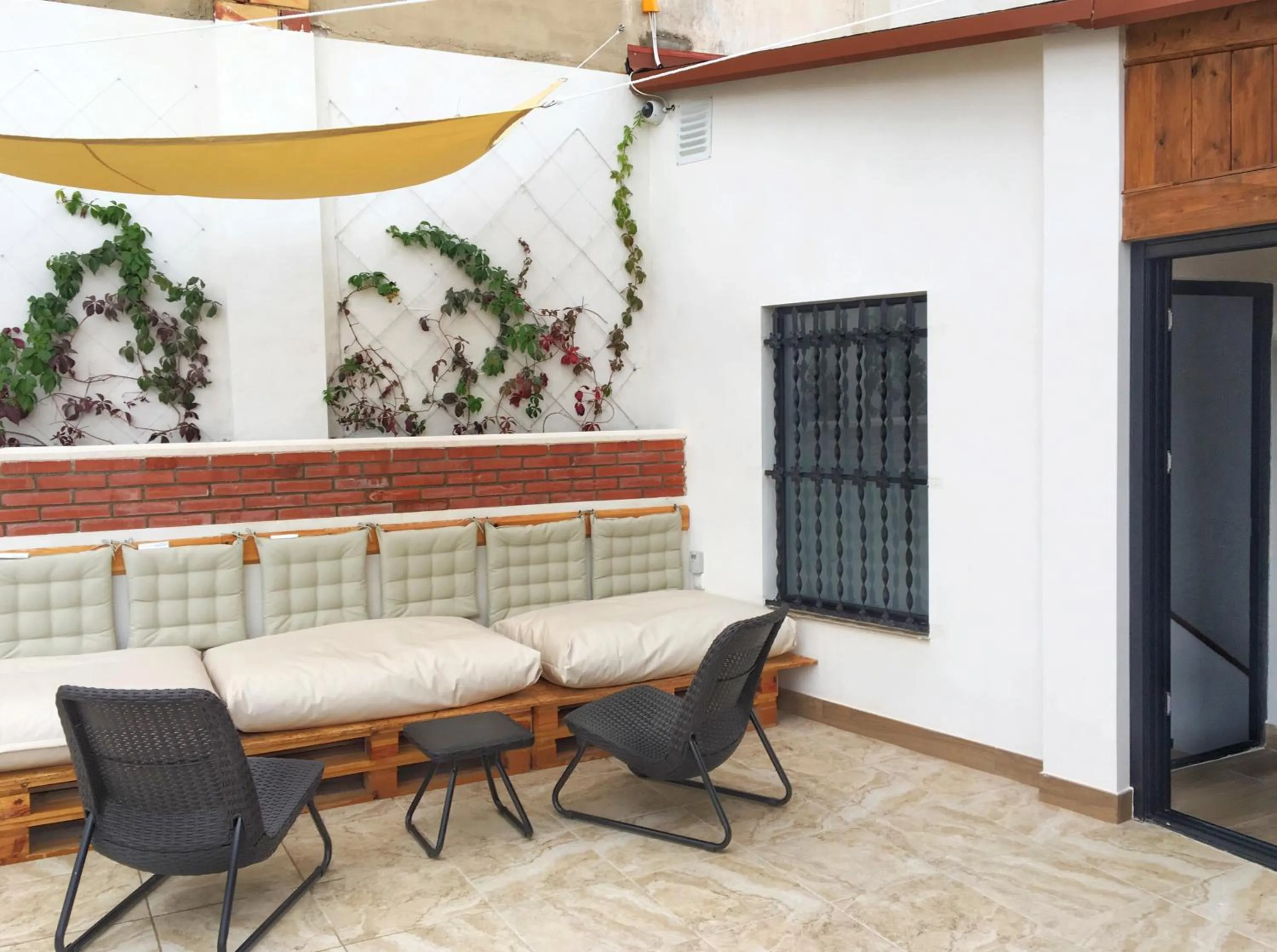Balcony/Terrace in Hostel Numero Trece - FREE towels, coffee & tea, remote check-in