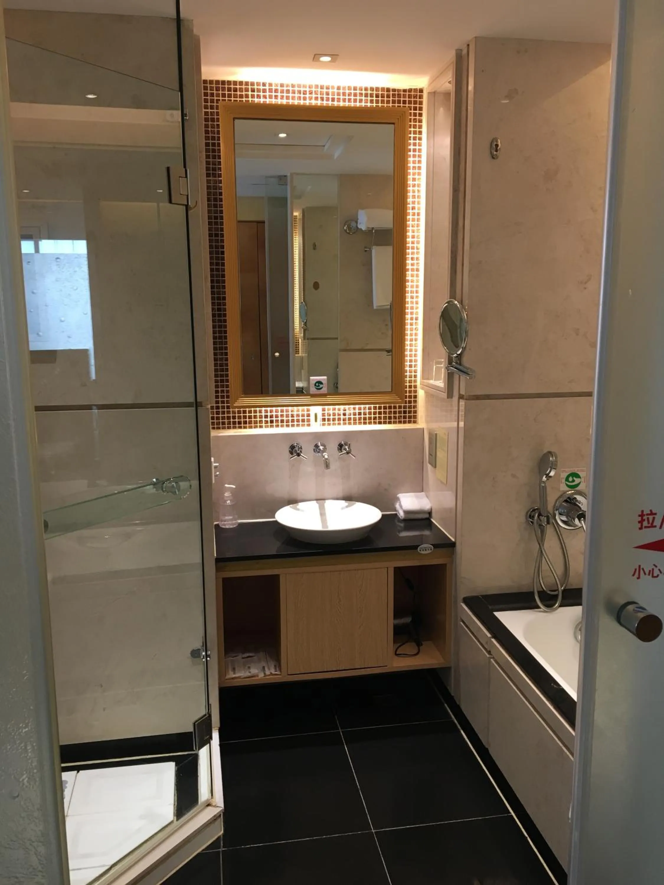 Bathroom in Ramada Plaza By Wyndham Taian