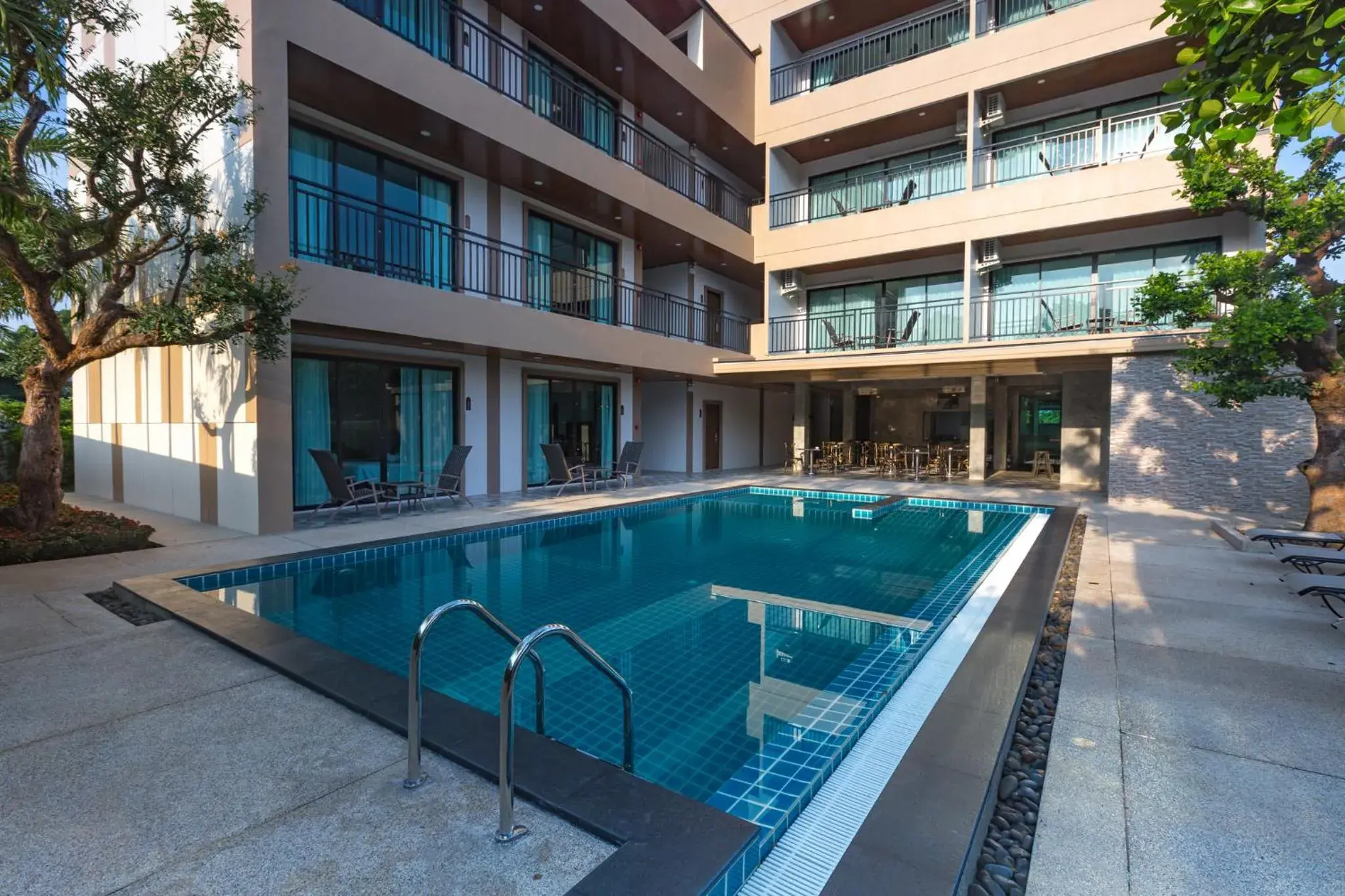 Swimming pool in The Bell Airport Phuket Hotel - SHA Extra Plus Swimming pool in The Bell Airport Phuket Hotel - SHA Extra Plus