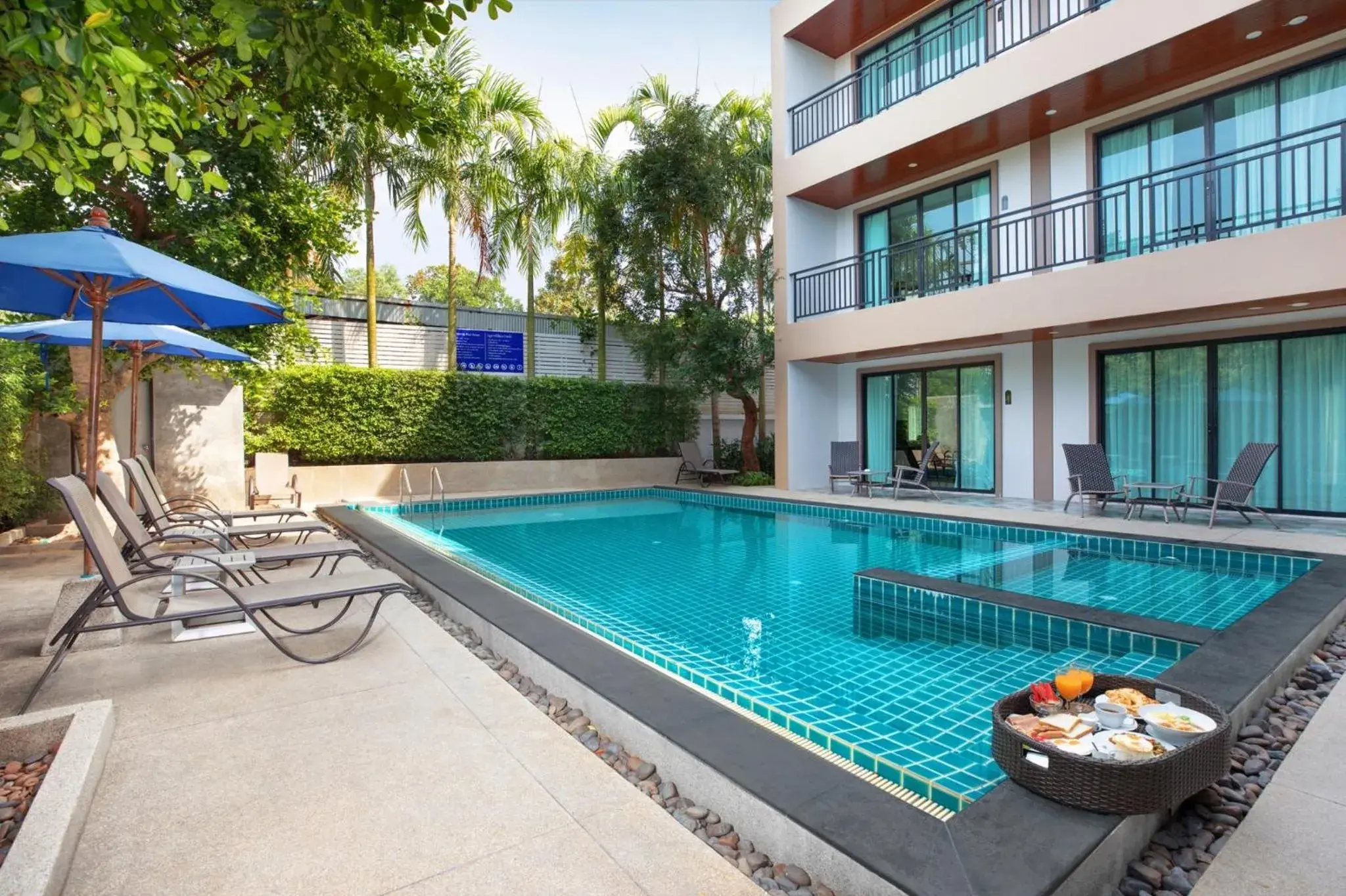 Pool view in The Bell Airport Phuket Hotel - SHA Extra Plus Pool view in The Bell Airport Phuket Hotel - SHA Extra Plus