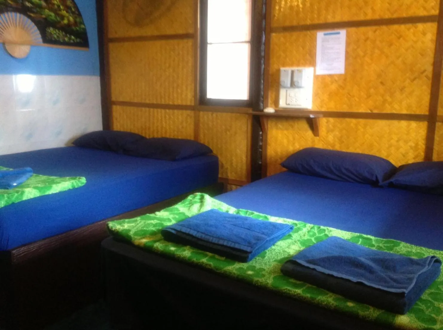 Photo of the whole room, Bed in New Hut Bungalow