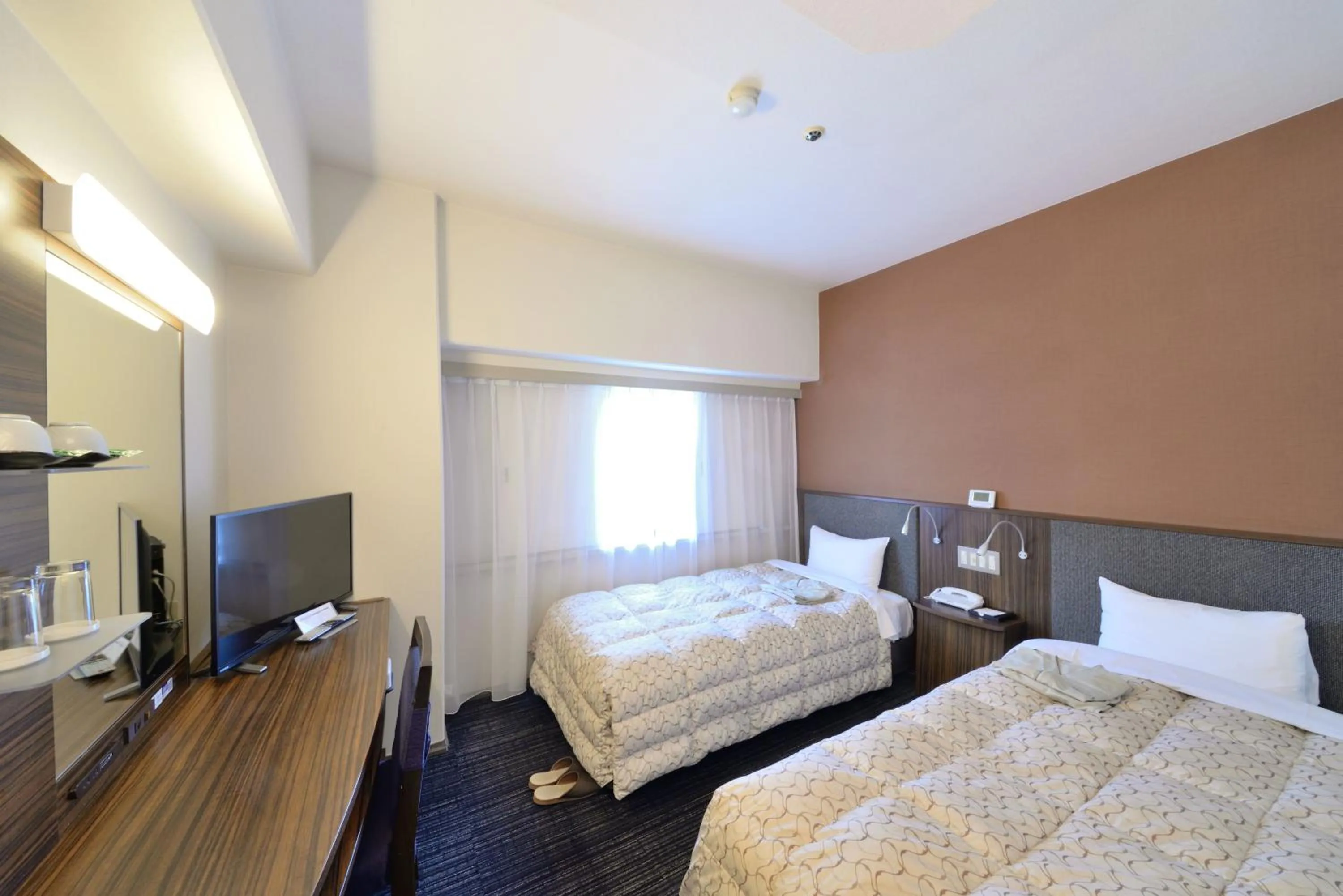 Photo of the whole room, Bed in Toyama Manten Hotel