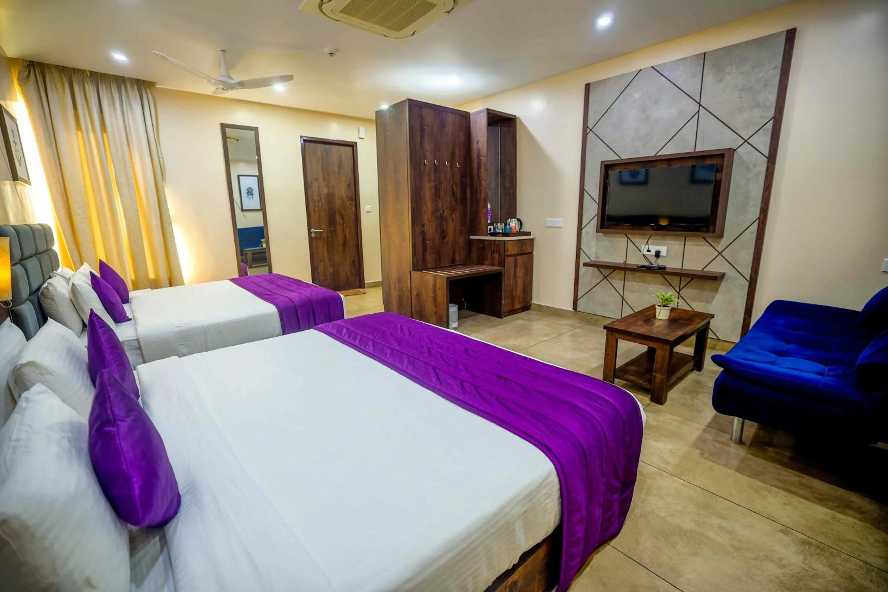 Communal lounge/ TV room, Bed in Anna Residency The Quintessential Boutique Hotel