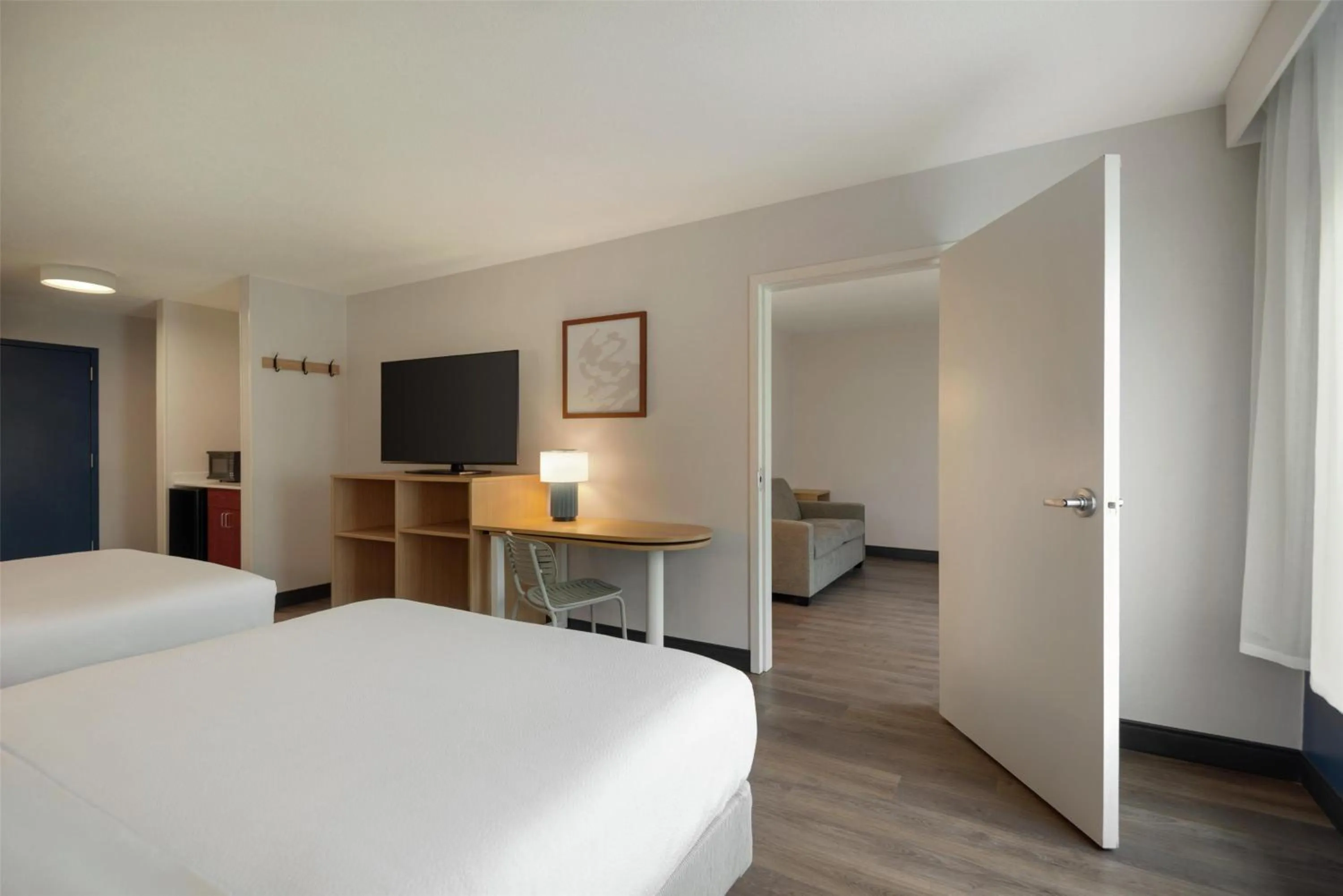 Living room, Bed in Spark by Hilton Woburn Boston