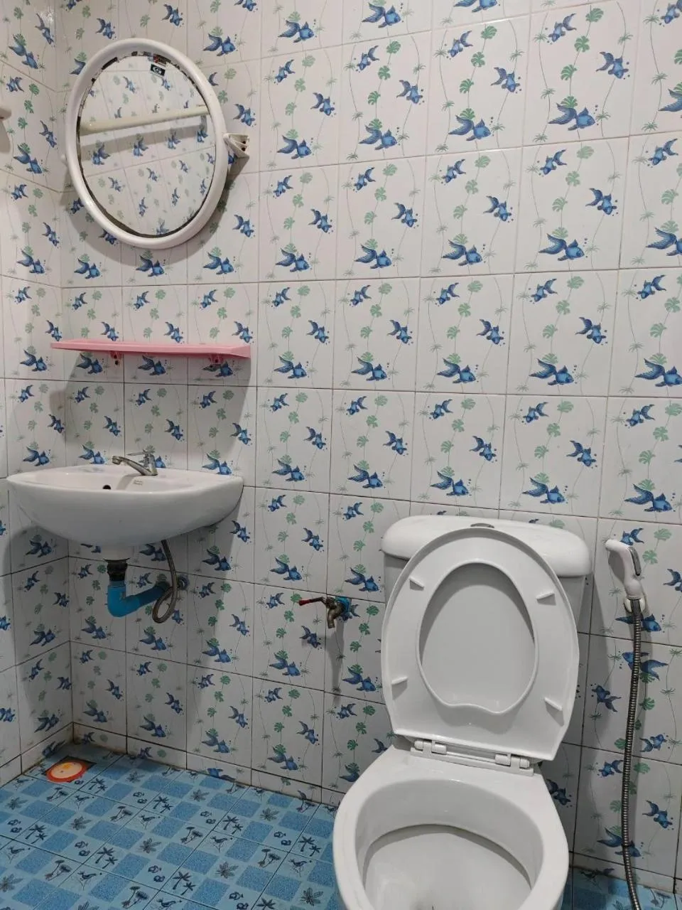 Toilet in Pooma Resort