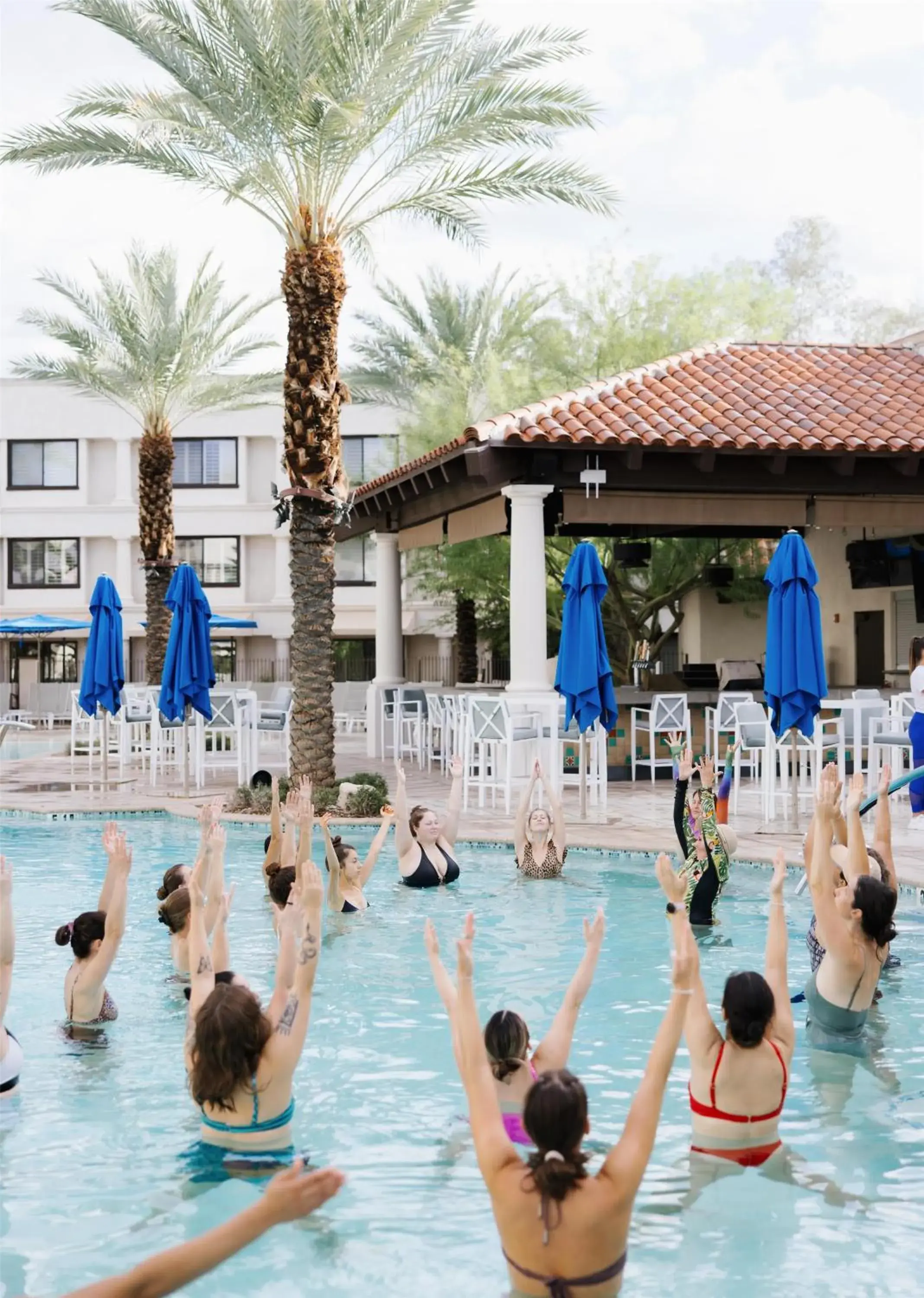 Pool view in The Scottsdale Resort & Spa, Curio Collection by Hilton Pool view in The Scottsdale Resort & Spa, Curio Collection by Hilton