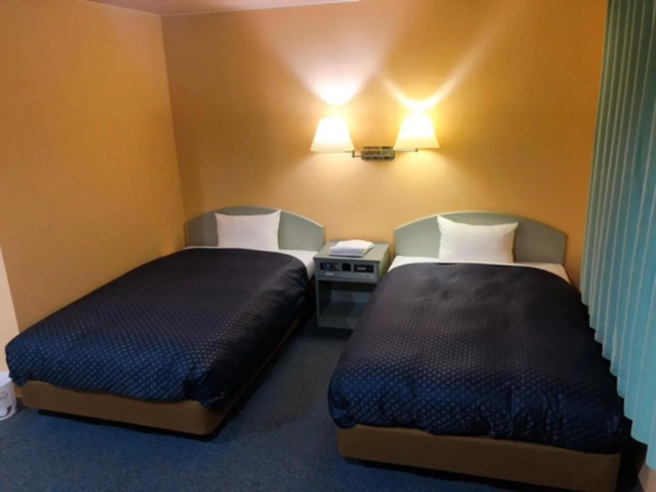 Bed in Seagrande Shimizu Station Hotel