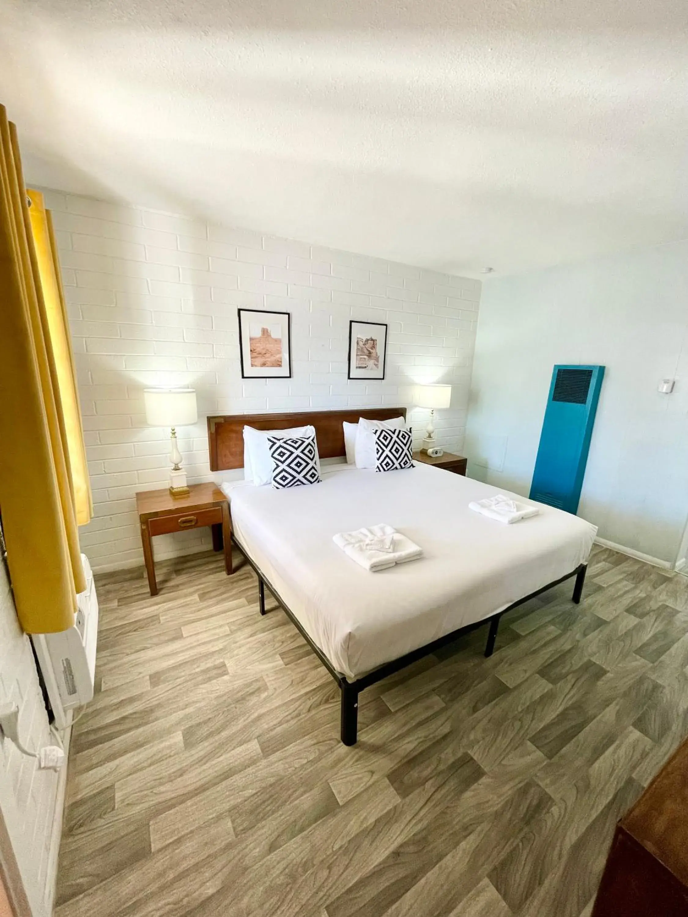 Bed in The Postcard Motel Bed in The Postcard Motel